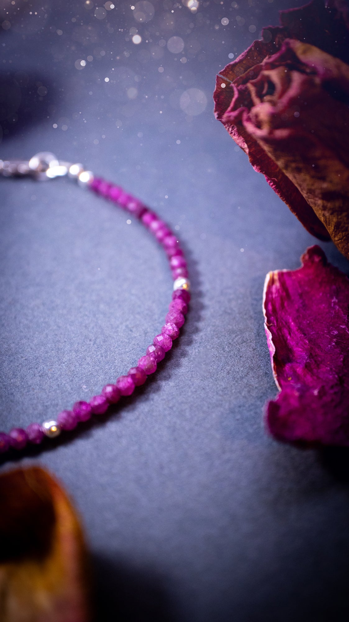 Handmade, made-to-order ruby crystal bracelets featuring natural, vibrant red ruby beads in a stacking style. Crafted with high-quality, rondelle-shaped crystals and customizable findings, each bracelet offers a bold and elegant touch. Ideal crystal gifts.