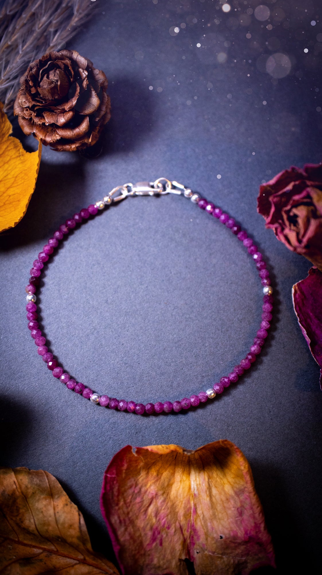 Handmade, made-to-order ruby crystal bracelets featuring natural, vibrant red ruby beads in a stacking style. Crafted with high-quality, rondelle-shaped crystals and customizable findings, each bracelet offers a bold and elegant touch. Ideal crystal gifts.