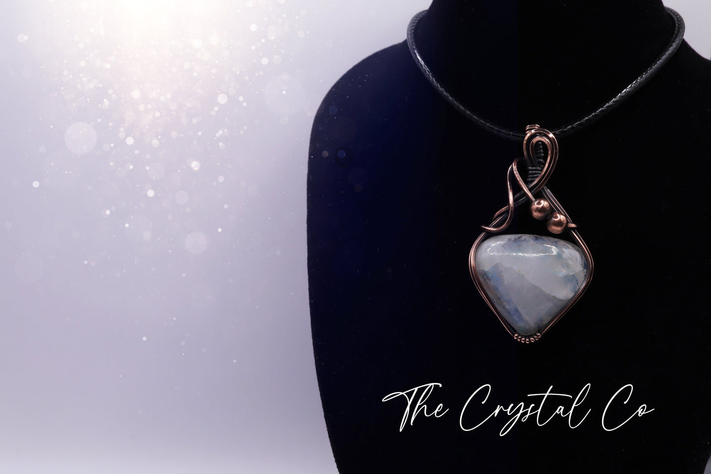 Beautiful flashy rainbow moonstone pendant, wire wrapped in antiqued copper wire Beautiful flashes of blue, greens and yellows Comes with a black cord chain. Ideal for individuals who love crystals and jewellery. Rainbow moonstone is also the birthstone for June making this an ideal gift for birthdays.