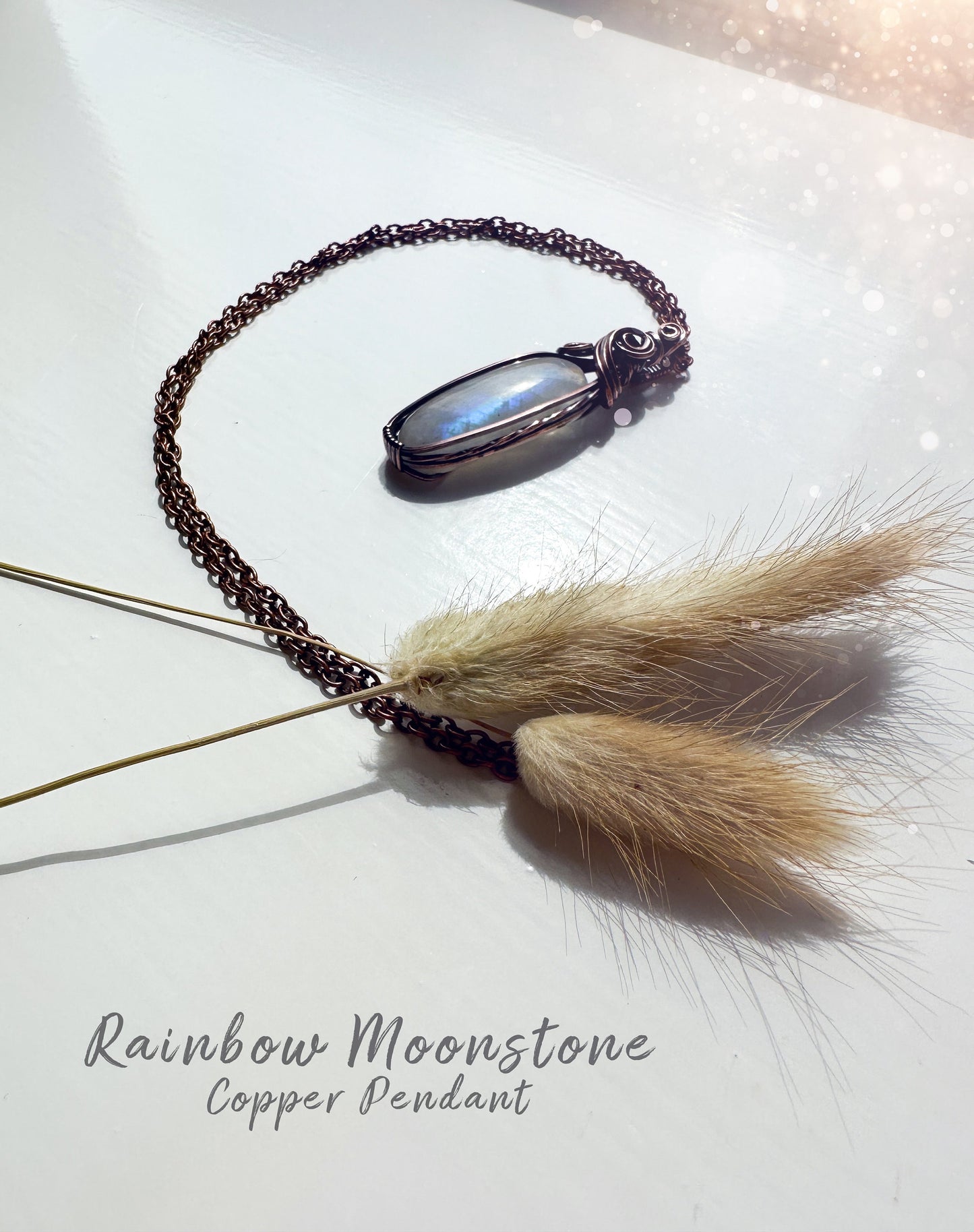 Beautifully hand wrapped, rainbow moonstone, copper pendant necklace. This pendant features a beautiful rainbow moonstone which is the birthstone for June. Wrapped in copper wire into a gorgeous pendant. Ideal for crystal and jewellery lovers. Gothic