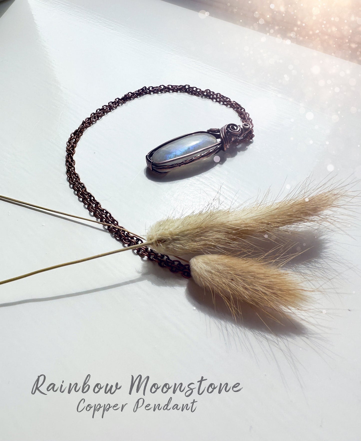 Beautifully hand wrapped, rainbow moonstone, copper pendant necklace. This pendant features a beautiful rainbow moonstone which is the birthstone for June. Wrapped in copper wire into a gorgeous pendant. Ideal for crystal and jewellery lovers. Gothic