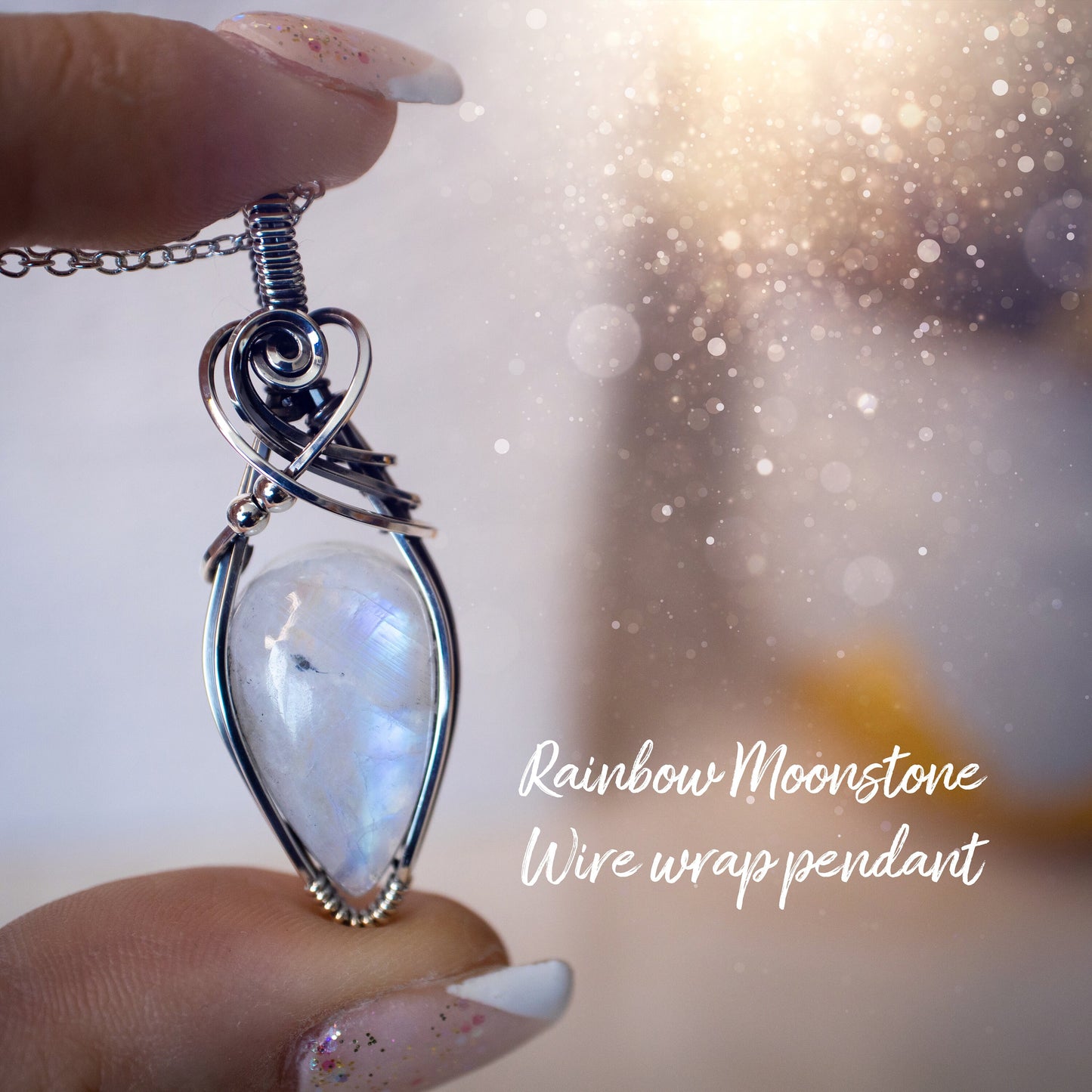 Beautifully handmade, rainbow moonstone wire wrapped pendant necklace. This pendant features a very flashy moonstone crystal which has been wrapped in sterling silver wire and antiqued to bring out the flash. Ideal gift for crystal lovers. Bohemian