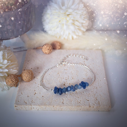 Silver plated, Kyanite bracelet. Featuring small, natural, deep blue kyanite crystal chips. The bracelet is 6.5inchs and comes with an extender. Beautiful and complimentary to any outfit or special occasion. Ideal Gift.
