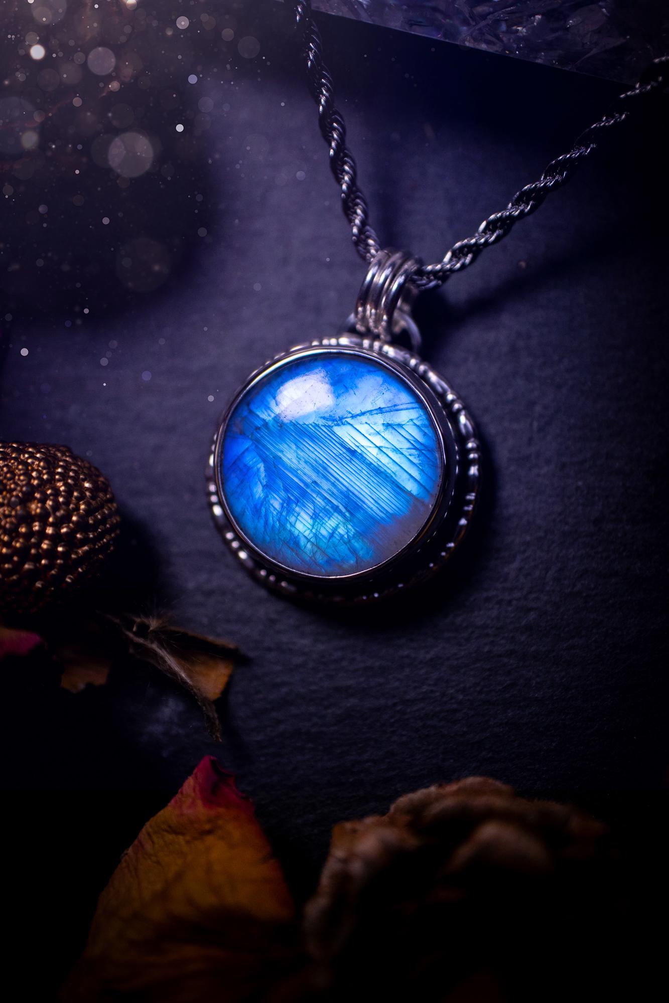 Handcrafted and unique, sterling silver, rainbow moonstone crystal pendant necklace. This necklace has been made using a beautiful flashy moonstone, with a minimal dainty design using recycled sterling silver. Ideal gift for crystal lovers. Gothic