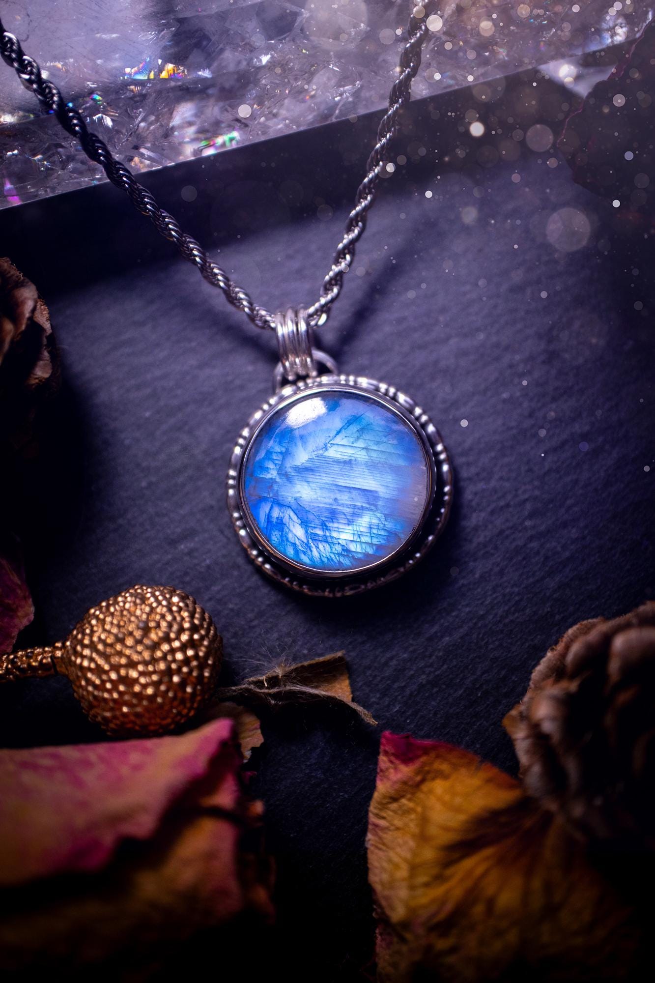 Handcrafted and unique, sterling silver, rainbow moonstone crystal pendant necklace. This necklace has been made using a beautiful flashy moonstone, with a minimal dainty design using recycled sterling silver. Ideal gift for crystal lovers. Gothic