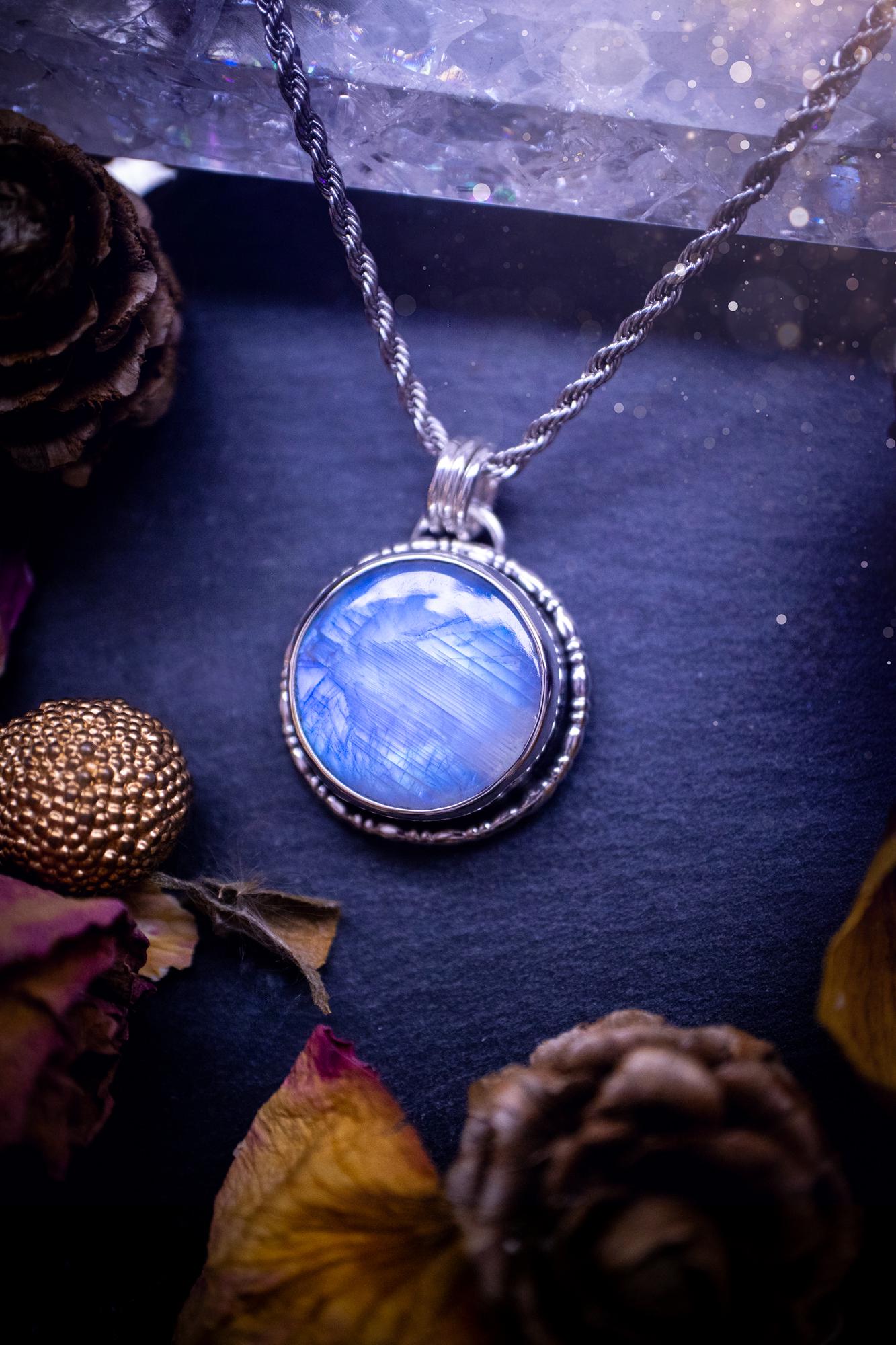 Handcrafted and unique, sterling silver, rainbow moonstone crystal pendant necklace. This necklace has been made using a beautiful flashy moonstone, with a minimal dainty design using recycled sterling silver. Ideal gift for crystal lovers. Gothic