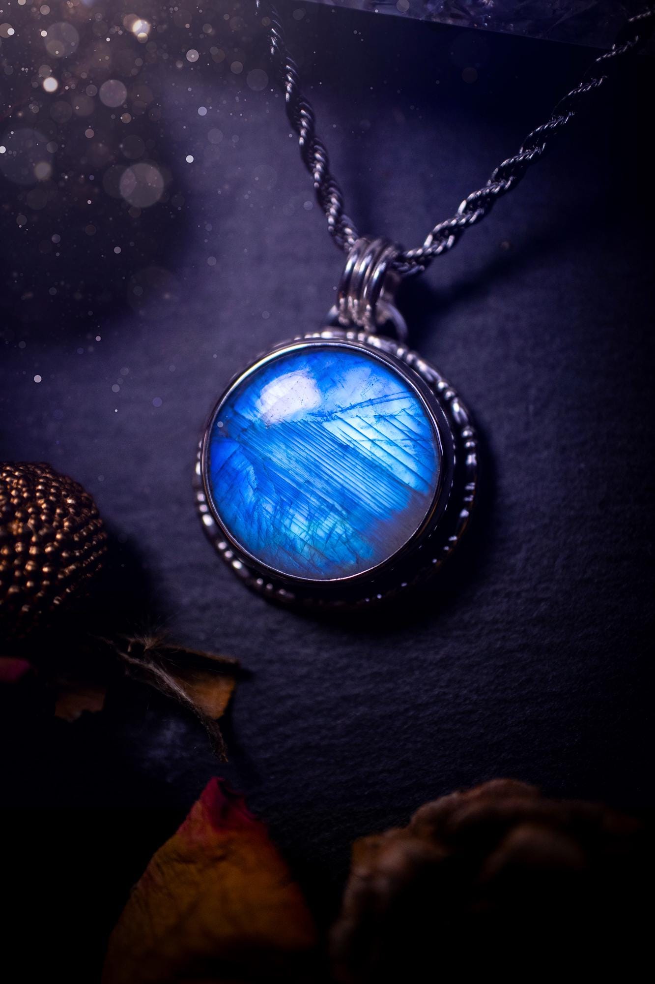 Handcrafted and unique, sterling silver, rainbow moonstone crystal pendant necklace. This necklace has been made using a beautiful flashy moonstone, with a minimal dainty design using recycled sterling silver. Ideal gift for crystal lovers. Gothic