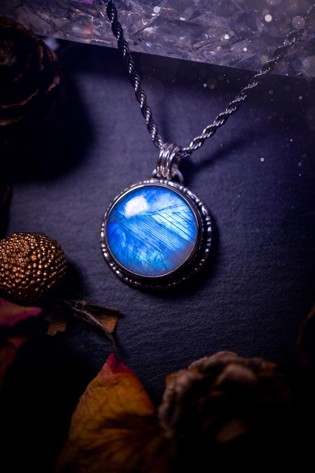 Handcrafted and unique, sterling silver, rainbow moonstone crystal pendant necklace. This necklace has been made using a beautiful flashy moonstone, with a minimal dainty design using recycled sterling silver. Ideal gift for crystal lovers. Gothic