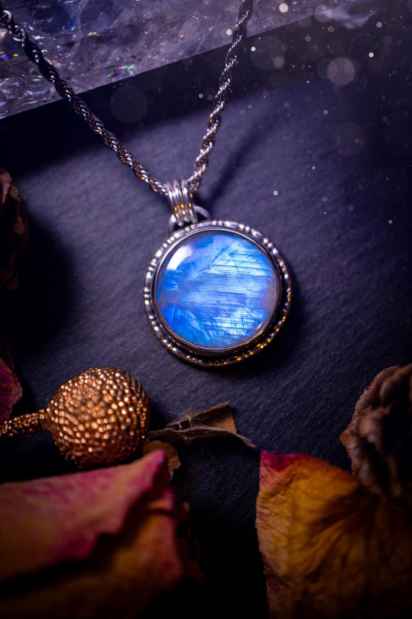Handcrafted and unique, sterling silver, rainbow moonstone crystal pendant necklace. This necklace has been made using a beautiful flashy moonstone, with a minimal dainty design using recycled sterling silver. Ideal gift for crystal lovers. Gothic