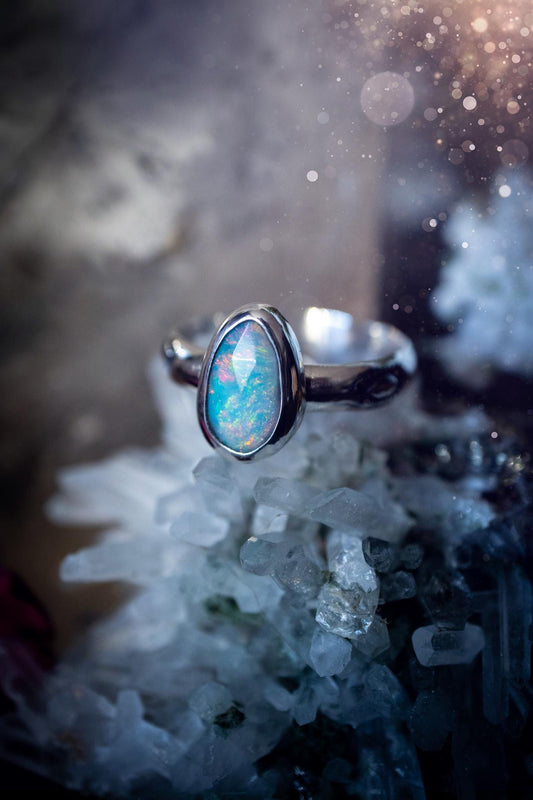 Handmade and beautiful, natural, Ethiopian welo opal, sterling silver stacking ring. This beautiful ring is a size T and features the most stunning sparkly opal. Made from recycled fine and sterling silver with a thick stamped ring shank. The ideal gift for any crystal or jewellery lover. Opal is the birthstone for October. Gothic and witchy jewellery, hippy and bohemian.