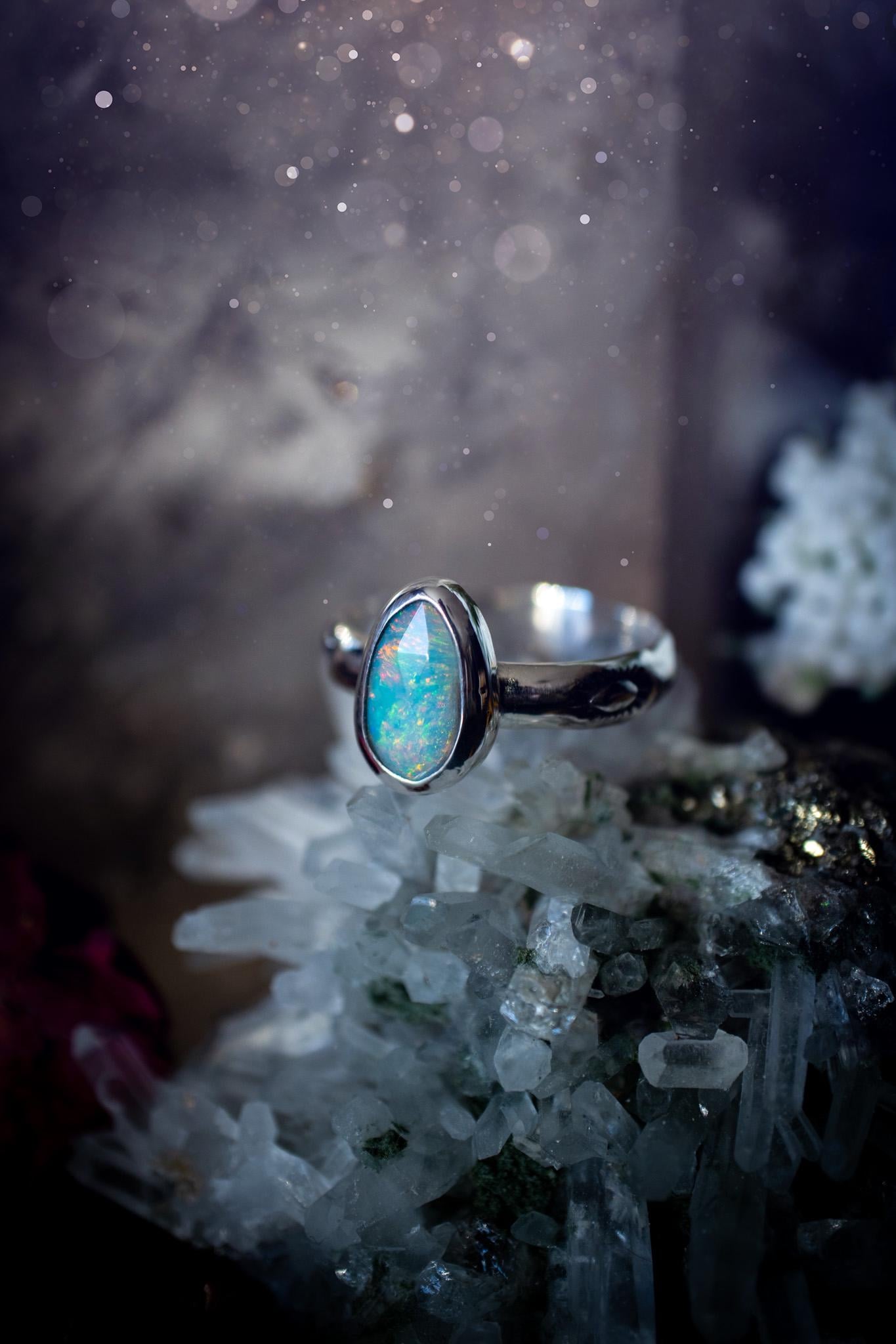 Handmade and beautiful, natural, Ethiopian welo opal, sterling silver stacking ring. This beautiful ring is a size T and features the most stunning sparkly opal. Made from recycled fine and sterling silver with a thick stamped ring shank. The ideal gift for any crystal or jewellery lover. Opal is the birthstone for October. Gothic and witchy jewellery, hippy and bohemian.