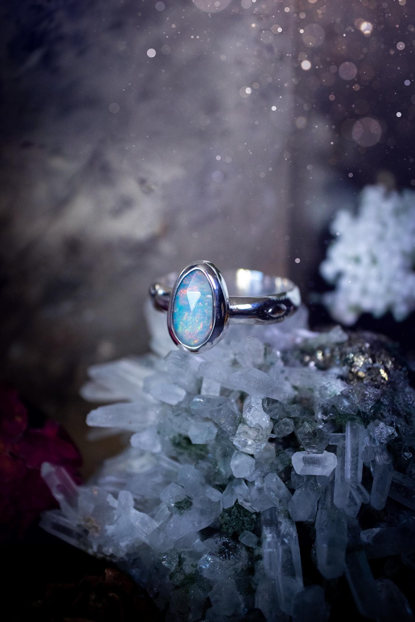 Handmade and beautiful, natural, Ethiopian welo opal, sterling silver stacking ring. This beautiful ring is a size T and features the most stunning sparkly opal. Made from recycled fine and sterling silver with a thick stamped ring shank. The ideal gift for any crystal or jewellery lover. Opal is the birthstone for October. Gothic and witchy jewellery, hippy and bohemian.
