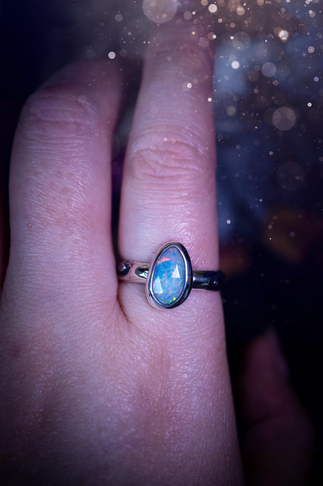 Handmade and beautiful, natural, Ethiopian welo opal, sterling silver stacking ring. This beautiful ring is a size T and features the most stunning sparkly opal. Made from recycled fine and sterling silver with a thick stamped ring shank. The ideal gift for any crystal or jewellery lover. Opal is the birthstone for October. Gothic and witchy jewellery, hippy and bohemian.