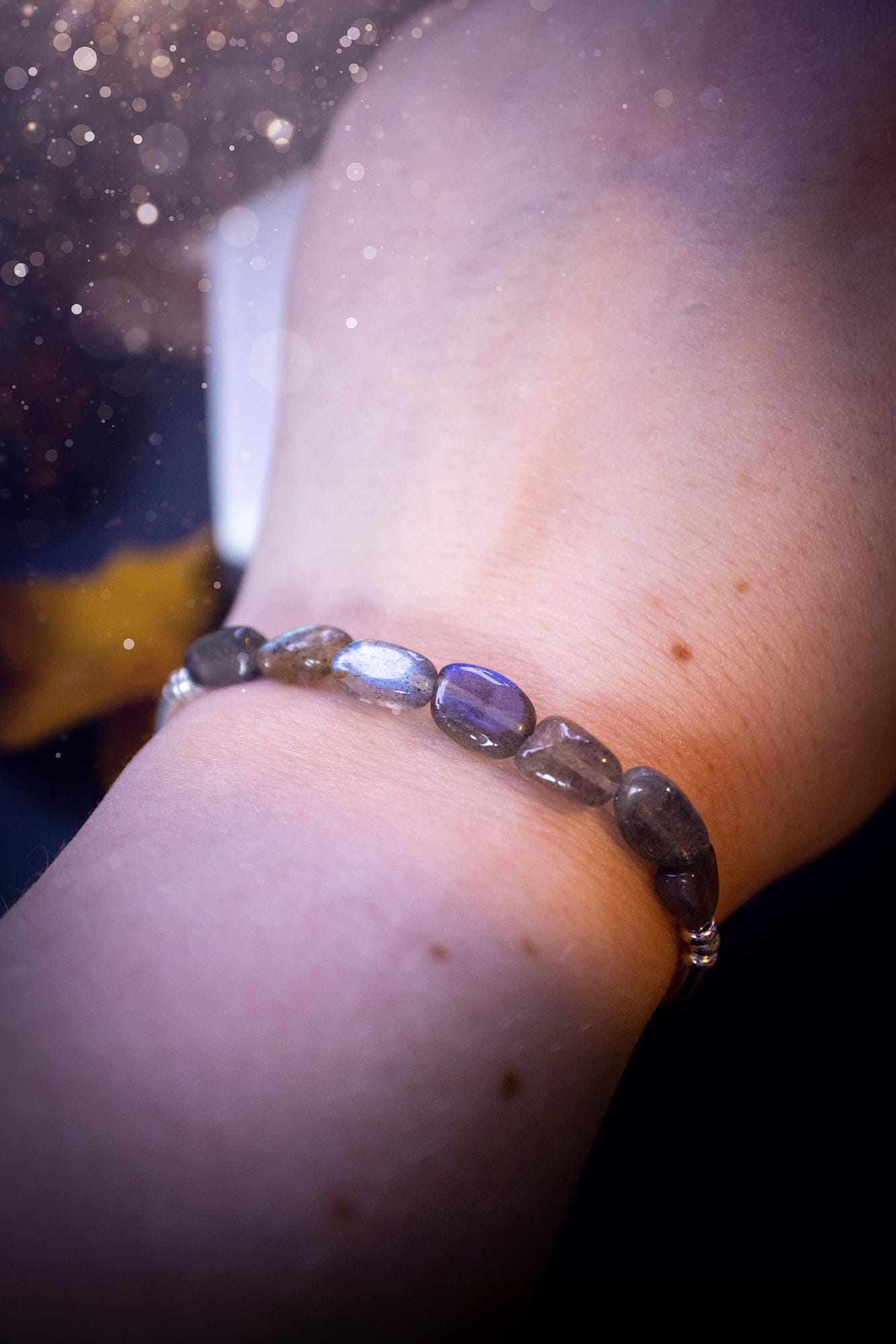 Beautiful and handmade, Labradorite crystal nugget, sterling silver stacking bracelet. This bracelet has been made using high quality sterling silver beads which have bee strung on strong 49 strand beading wire. This wire is very strong, but also gives a beautiful drape across the wrist. Featuring beautiful and flashy labradorite crystal nugget beads. This bracelet is ideal for stacking with others, and makes a lovely gift for jewellery lovers.