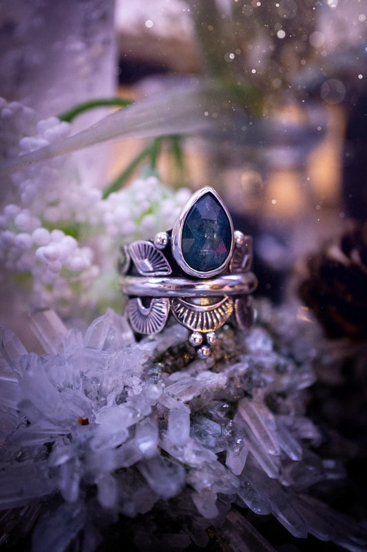 Beautiful and one of a kind, deep blue aqua kyanite crystal, statement ring. Size O 1/2. This stunning and unique ring has been handmade using a high grade kyanite crystal. The kyanite is rose cut giving a gorgeous sparkle, it even has a little shimmering flash. Made from recycled fine and sterling silver and designed with different stamps on a wide band. A very pretty piece to gift to a loved one or to treat yourself. Bohemian, gothic and witchy crystal jewellery.