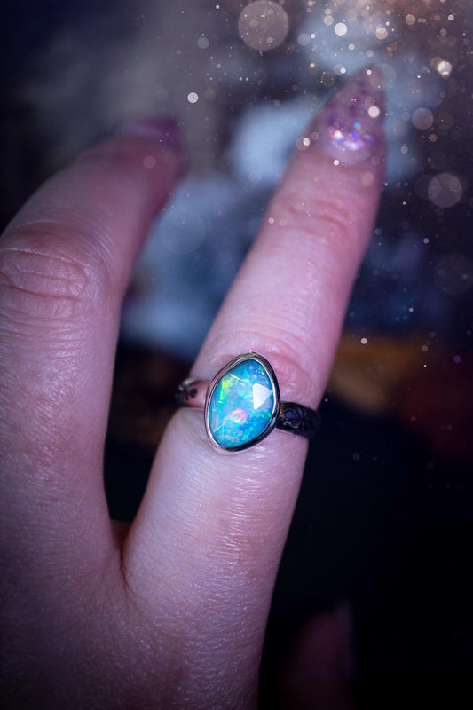 Handmade and beautiful, natural, Ethiopian welo opal, sterling silver stacking ring. This beautiful ring is a size O 1/2 and features the most stunning sparkly opal. Made from recycled fine and sterling silver with a thick stamped ring shank. The ideal gift for any crystal or jewellery lover. Opal is the birthstone for October. Gothic and witchy jewellery, hippy and bohemian.