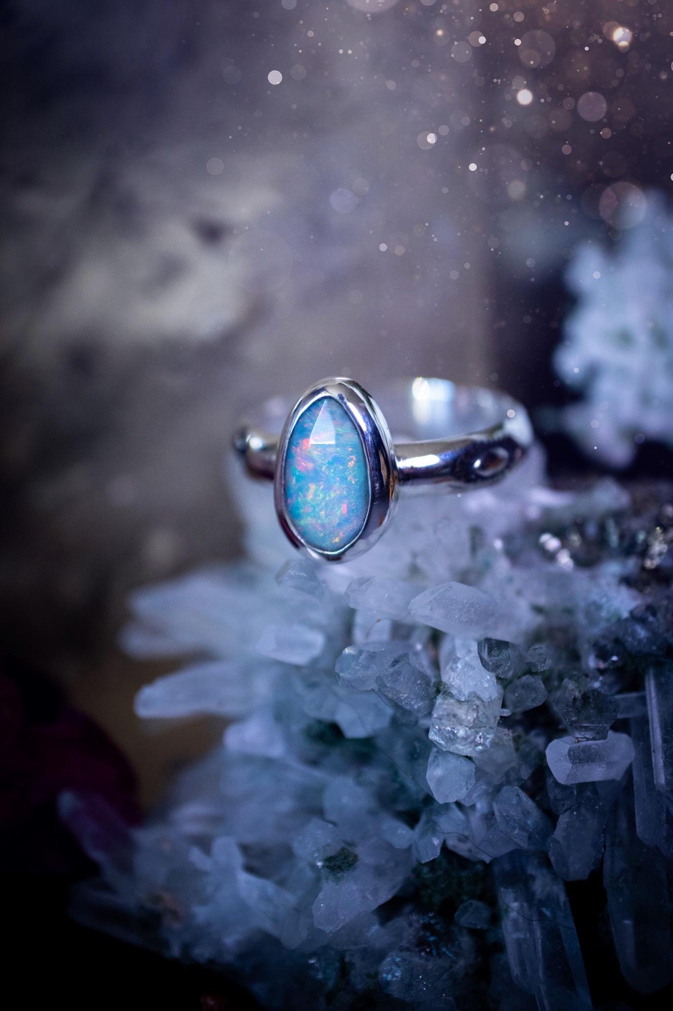 Handmade and beautiful, natural, Ethiopian welo opal, sterling silver stacking ring. This beautiful ring is a size T and features the most stunning sparkly opal. Made from recycled fine and sterling silver with a thick stamped ring shank. The ideal gift for any crystal or jewellery lover. Opal is the birthstone for October. Gothic and witchy jewellery, hippy and bohemian.