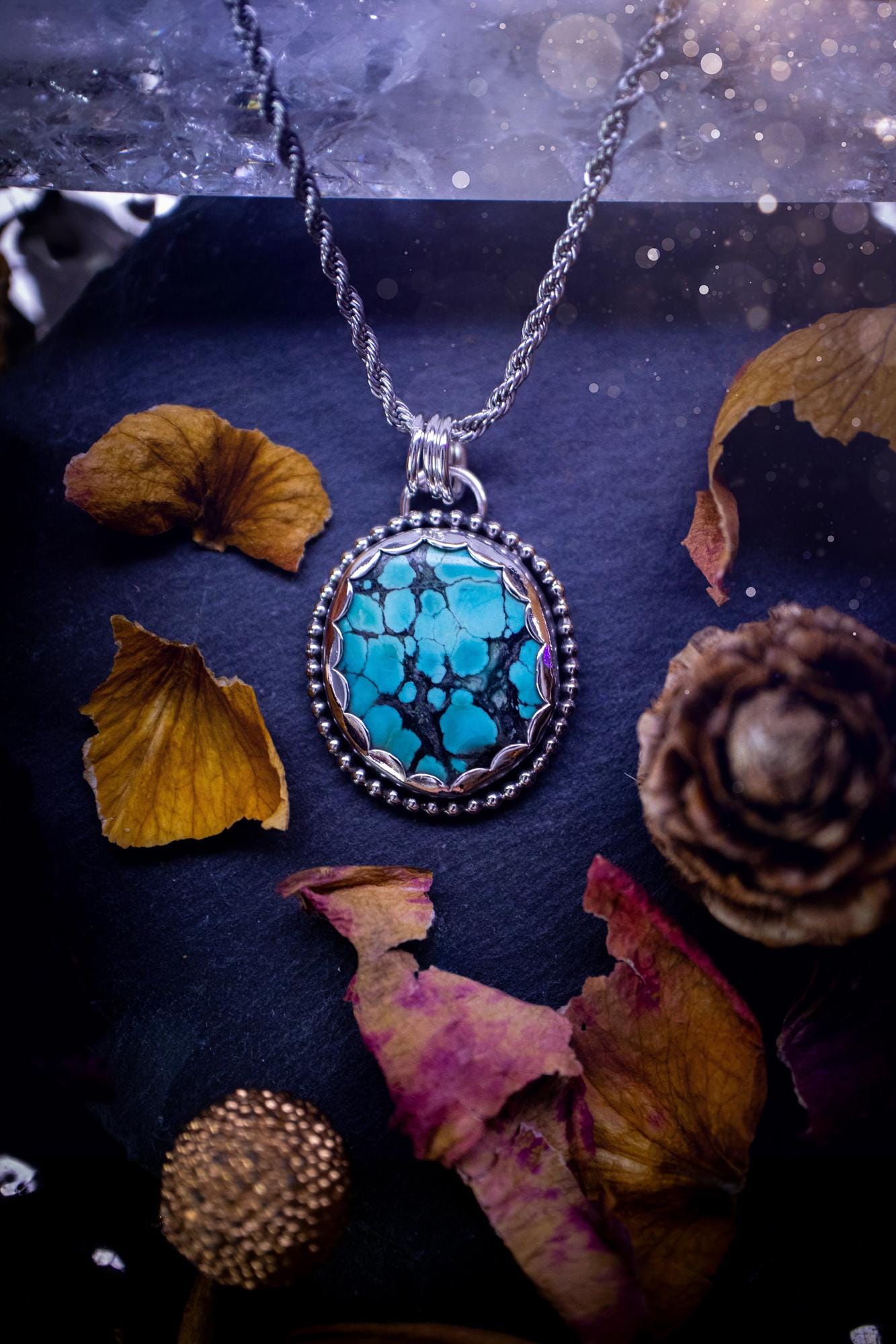 Unique and handmade, turquoise crystal pendant necklace. This Pendant has been made from recycled fine and sterling silver and features scallop and beaded wire detail around the crystal. The turquoise is A grade quality and would make the ideal gift for jewellery and crystal lovers. A crystal just like the ocean