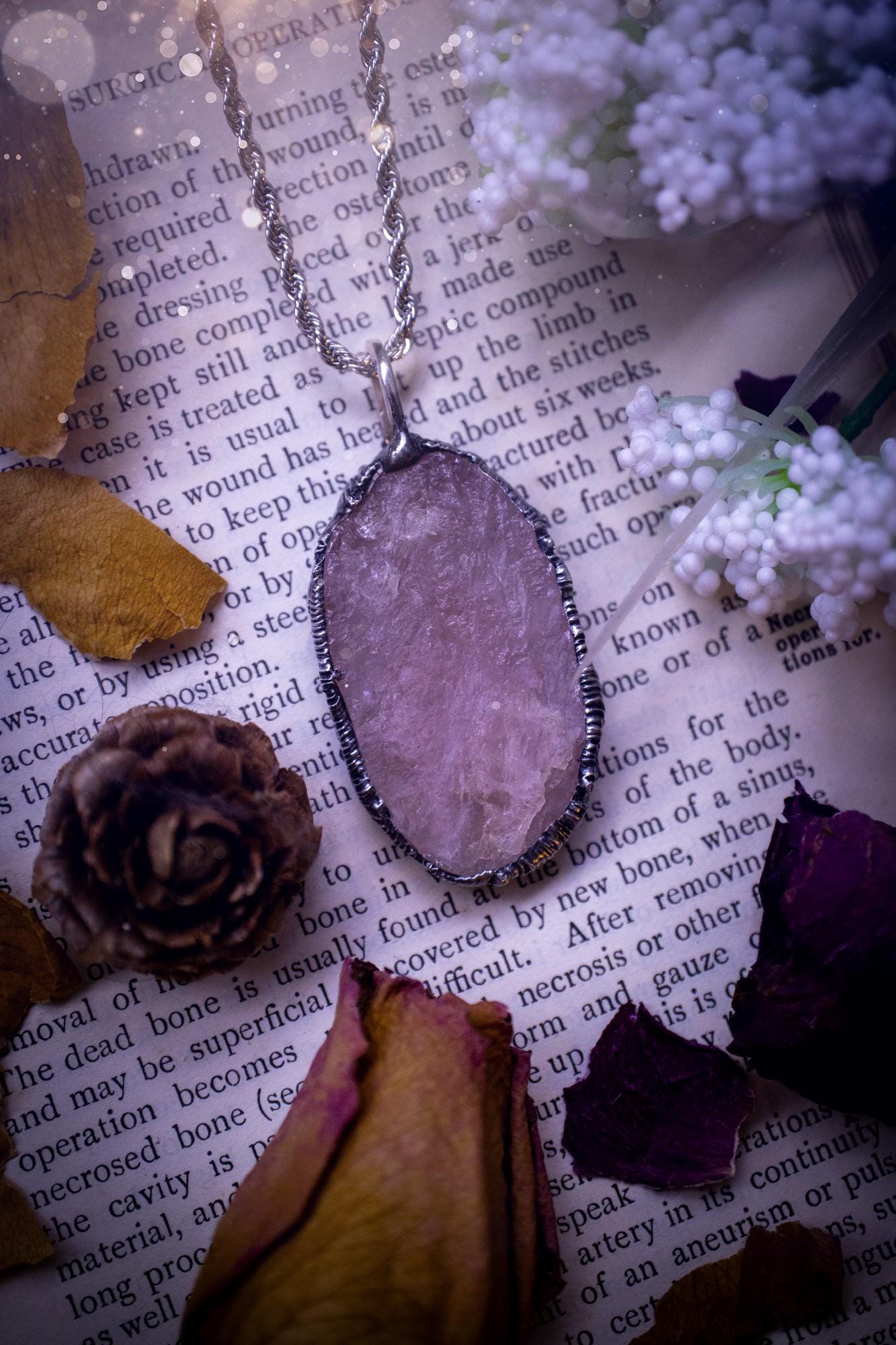 Natures finest, beautiful and raw, rose quartz, soft soldered crystal pendant necklace. This piece of jewellery is carefully handmade using the soft solder method, also known as the tiffany technique. Featuring the most natural and stunning, raw, rose quartz crystal full of pink hues. A very unique piece of jewellery. This pendant necklace would be ideal for any special occasion and for gifting to a loved one. Witchy and gothic jewellery created for the soul.