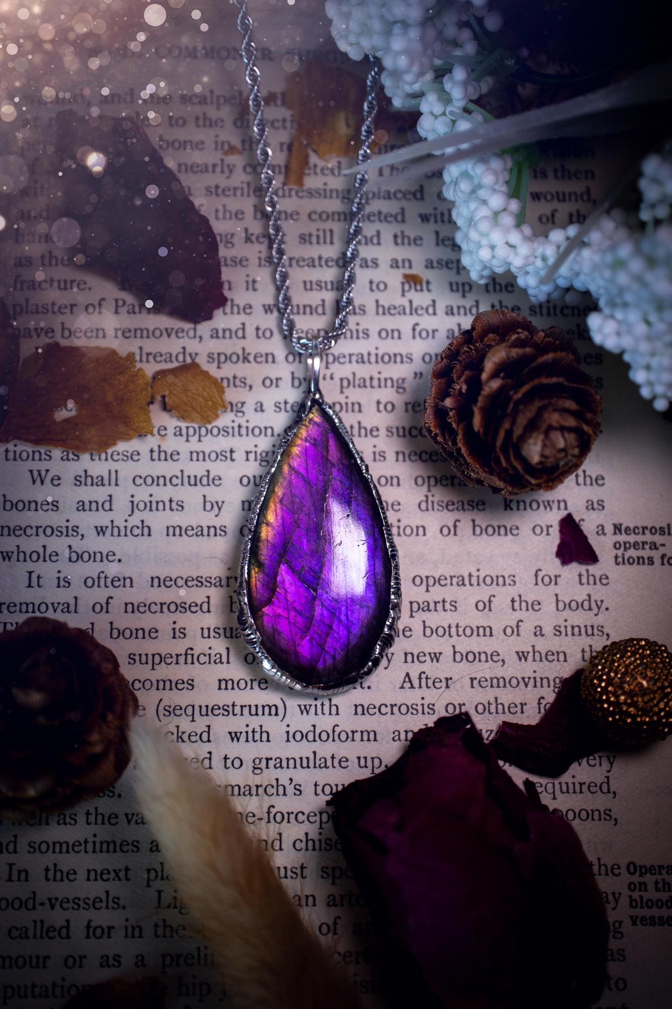 A beautiful, one of a kind, purple, green and grey multi-flash Labradorite crystal pendant necklace. This pendant has been handmade using the soft solder method, also known as the tiffany technique used to create stained glass windows. Featuring the most stunning and natural Labradorite crystal which is full of purple and green hues. The pendant is suitable for gifting to any jewellery or crystal lover, or to simply add to your own collection. One of a kind jewellery, gothic and witchy gifts