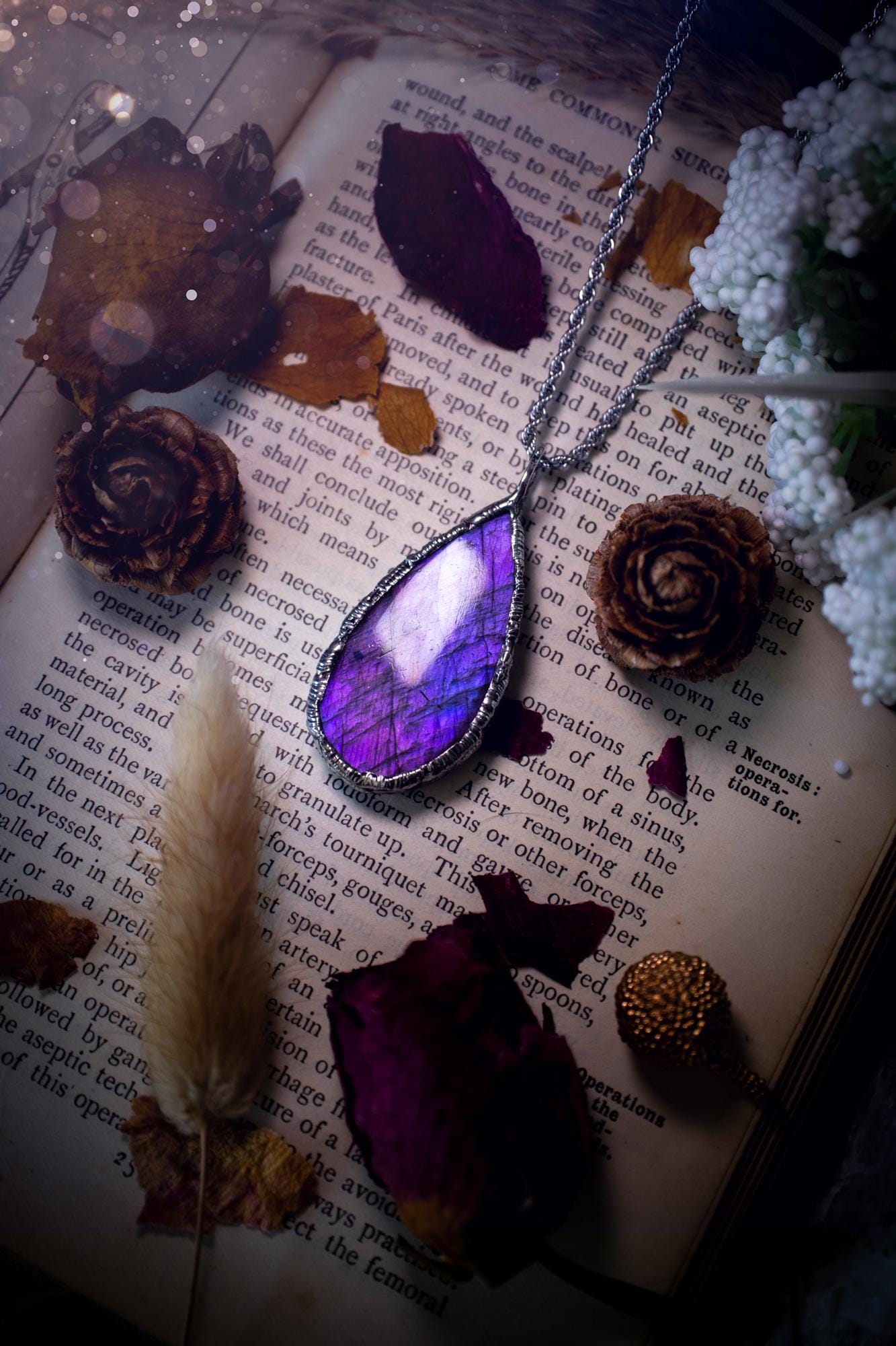 A beautiful, one of a kind, purple, green and grey multi-flash Labradorite crystal pendant necklace. This pendant has been handmade using the soft solder method, also known as the tiffany technique used to create stained glass windows. Featuring the most stunning and natural Labradorite crystal which is full of purple and green hues. The pendant is suitable for gifting to any jewellery or crystal lover, or to simply add to your own collection. One of a kind jewellery, gothic and witchy gifts