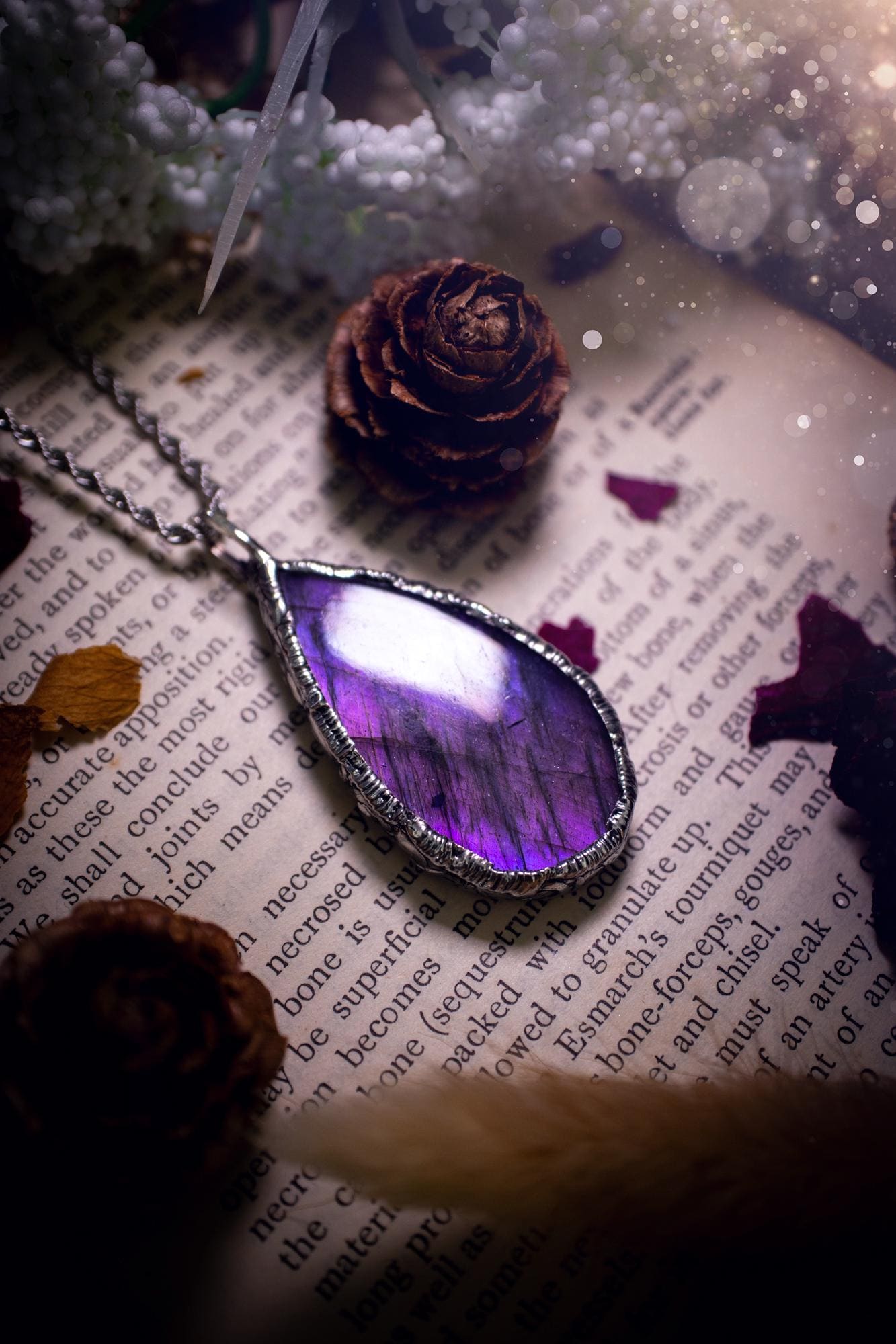 A beautiful, one of a kind, purple, green and grey multi-flash Labradorite crystal pendant necklace. This pendant has been handmade using the soft solder method, also known as the tiffany technique used to create stained glass windows. Featuring the most stunning and natural Labradorite crystal which is full of purple and green hues. The pendant is suitable for gifting to any jewellery or crystal lover, or to simply add to your own collection. One of a kind jewellery, gothic and witchy gifts