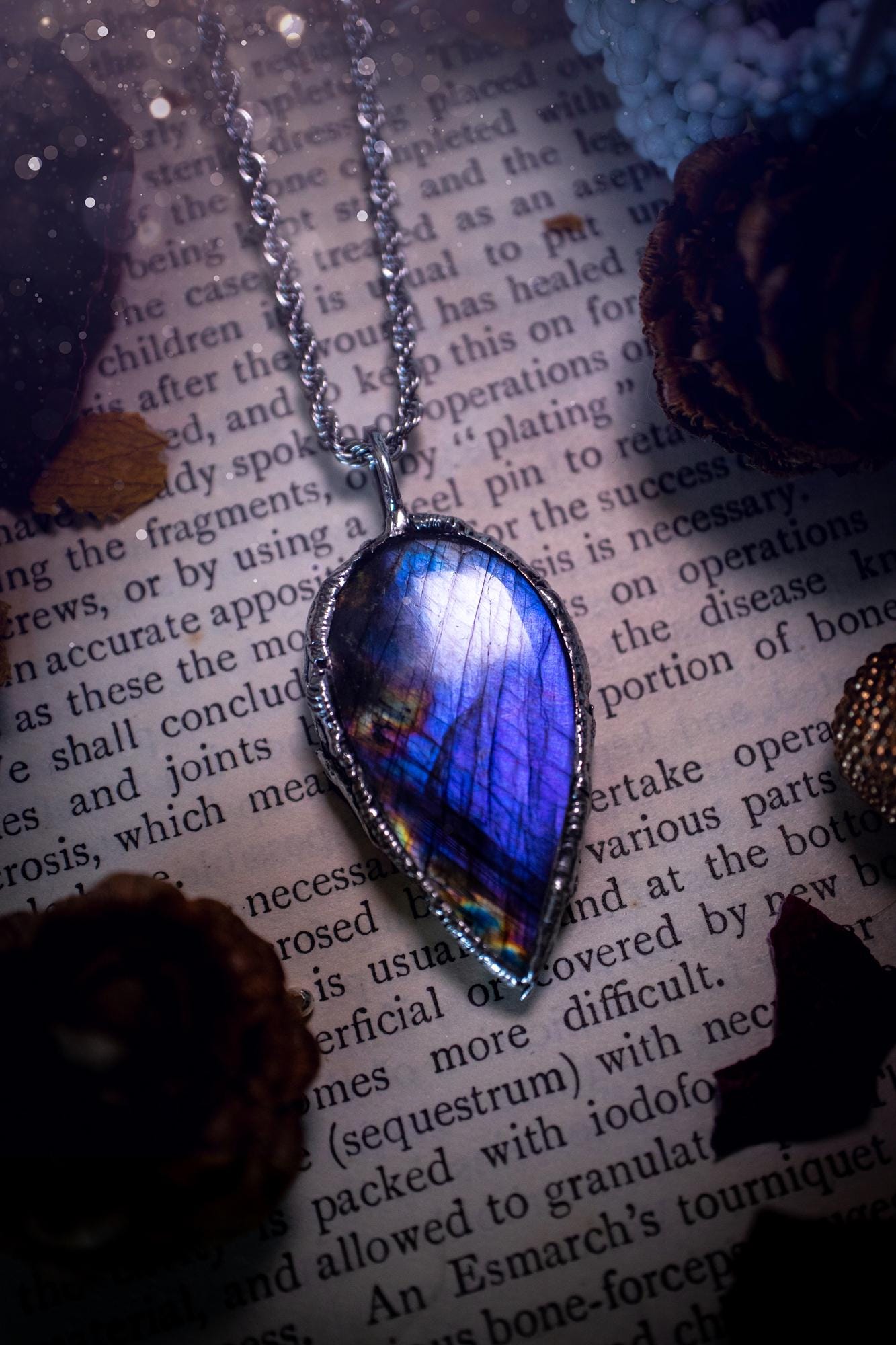 A beautiful, one of a kind, purple, green and grey multi-flash Labradorite crystal pendant necklace. This pendant has been handmade using the soft solder method, also known as the tiffany technique used to create stained glass windows. Featuring the most stunning and natural Labradorite crystal which is full of purple and green hues. The pendant is suitable for gifting to any jewellery or crystal lover, or to simply add to your own collection. One of a kind jewellery, gothic and witchy gifts