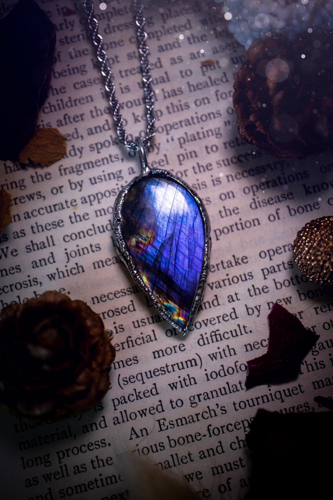 A beautiful, one of a kind, purple, green and grey multi-flash Labradorite crystal pendant necklace. This pendant has been handmade using the soft solder method, also known as the tiffany technique used to create stained glass windows. Featuring the most stunning and natural Labradorite crystal which is full of purple and green hues. The pendant is suitable for gifting to any jewellery or crystal lover, or to simply add to your own collection. One of a kind jewellery, gothic and witchy gifts