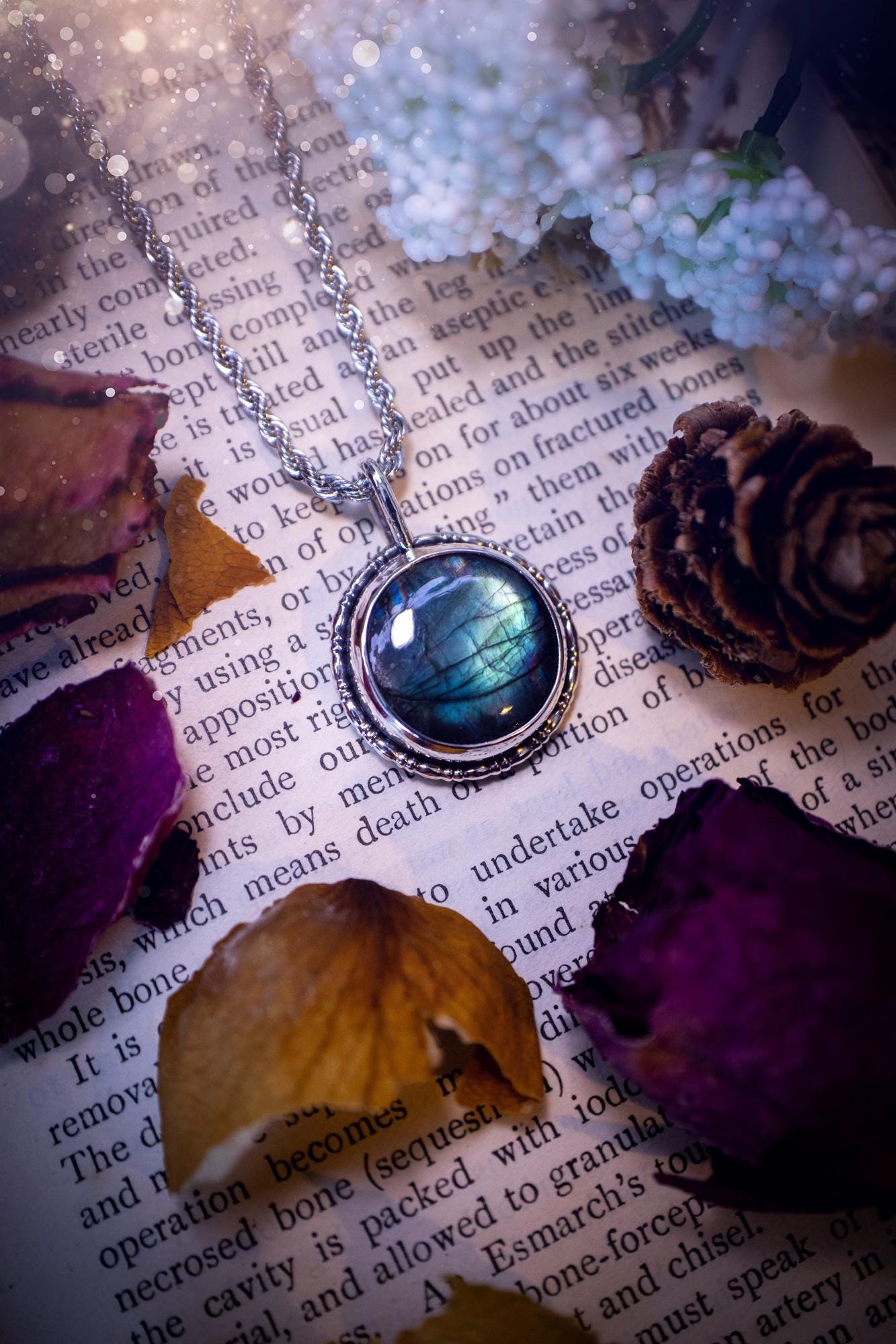 Beautiful and handmade, teal green with a little rainbow, sterling silver pendant necklace. This necklace features a beautiful, forest teal green Labradorite crystal that is completely natural. The pendant itself has been handcrafted using a mix of 999 fine and sterling silver with gallery wire around the bezel to give it a unique feel. A one of a kind piece of jewellery that would complete any crystal or jewellery lovers collection. Witchy and gothic vibes, jewellery gifts for her.