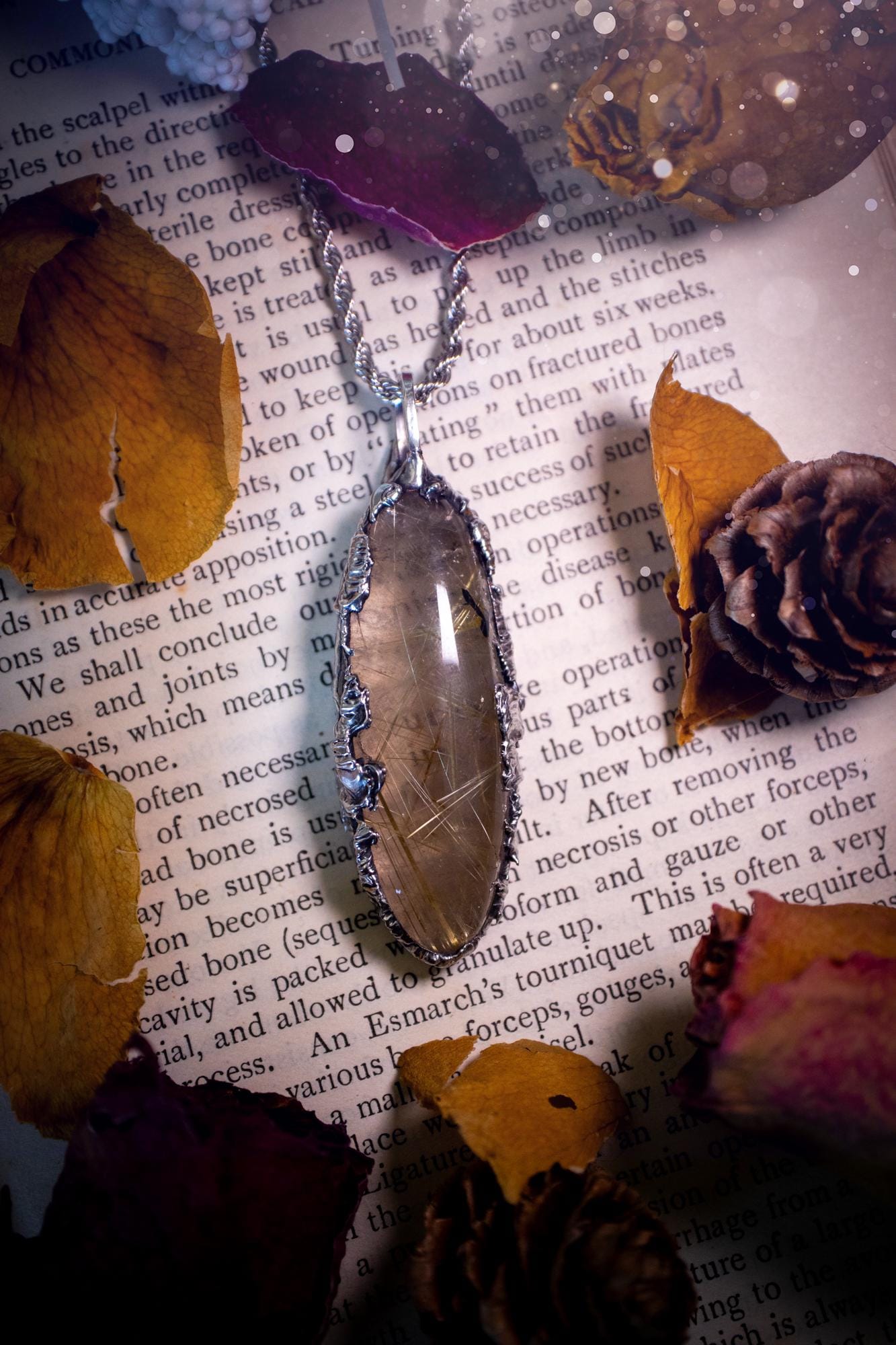 Handcrafted and unique, golden rutile quartz crystal, soft soldered pendant necklace. This pendant necklace has been handcrafted using the soft soldering method, also known as the tiffany technique. This method uses lead free solder which contains elements of silver for a high polish. This pendant features the most gorgeous and high quality, gold rutile quartz full of golden stripes with high clarity. Ideal gift for crystal and jewellery lovers. Witchy and gothic jewellery gifts for her.