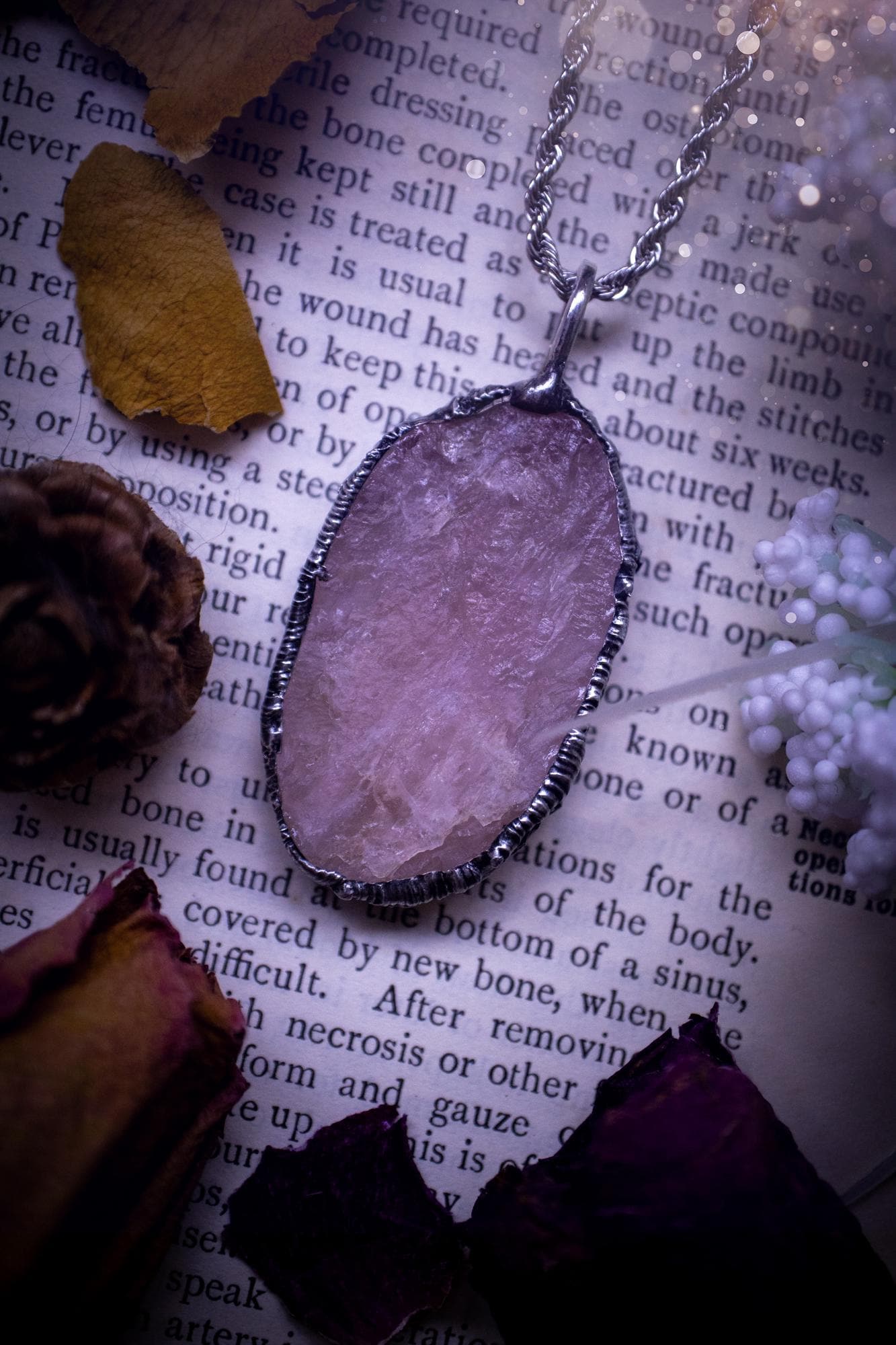 Natures finest, beautiful and raw, rose quartz, soft soldered crystal pendant necklace. This piece of jewellery is carefully handmade using the soft solder method, also known as the tiffany technique. Featuring the most natural and stunning, raw, rose quartz crystal full of pink hues. A very unique piece of jewellery. This pendant necklace would be ideal for any special occasion and for gifting to a loved one. Witchy and gothic jewellery created for the soul.