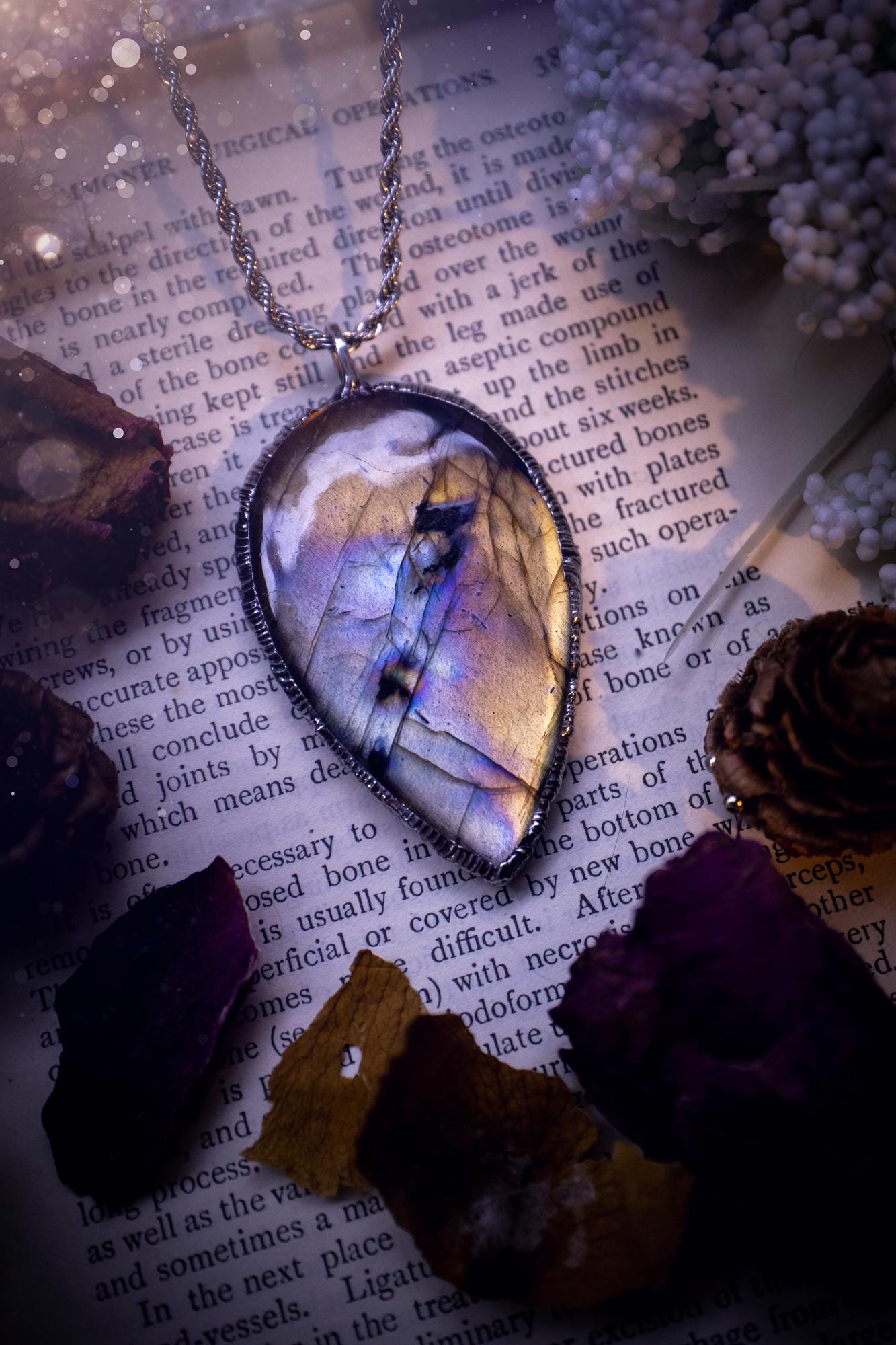 The ultimate labradorite soft soldered pendant necklace. This pendant necklace features the most beautiful, natural and very unique Labradorite spectrolite crystal that has so many hues of silver, purple, pink and orange. Handmade using the tiffany technique, also known as soft soldering. This piece is made from solder which contains silver and is safe to wear. The ideal gift for any jewellery lover and crystal collector! Witchy, gothic and hippy jewellery that has been made for the soul.