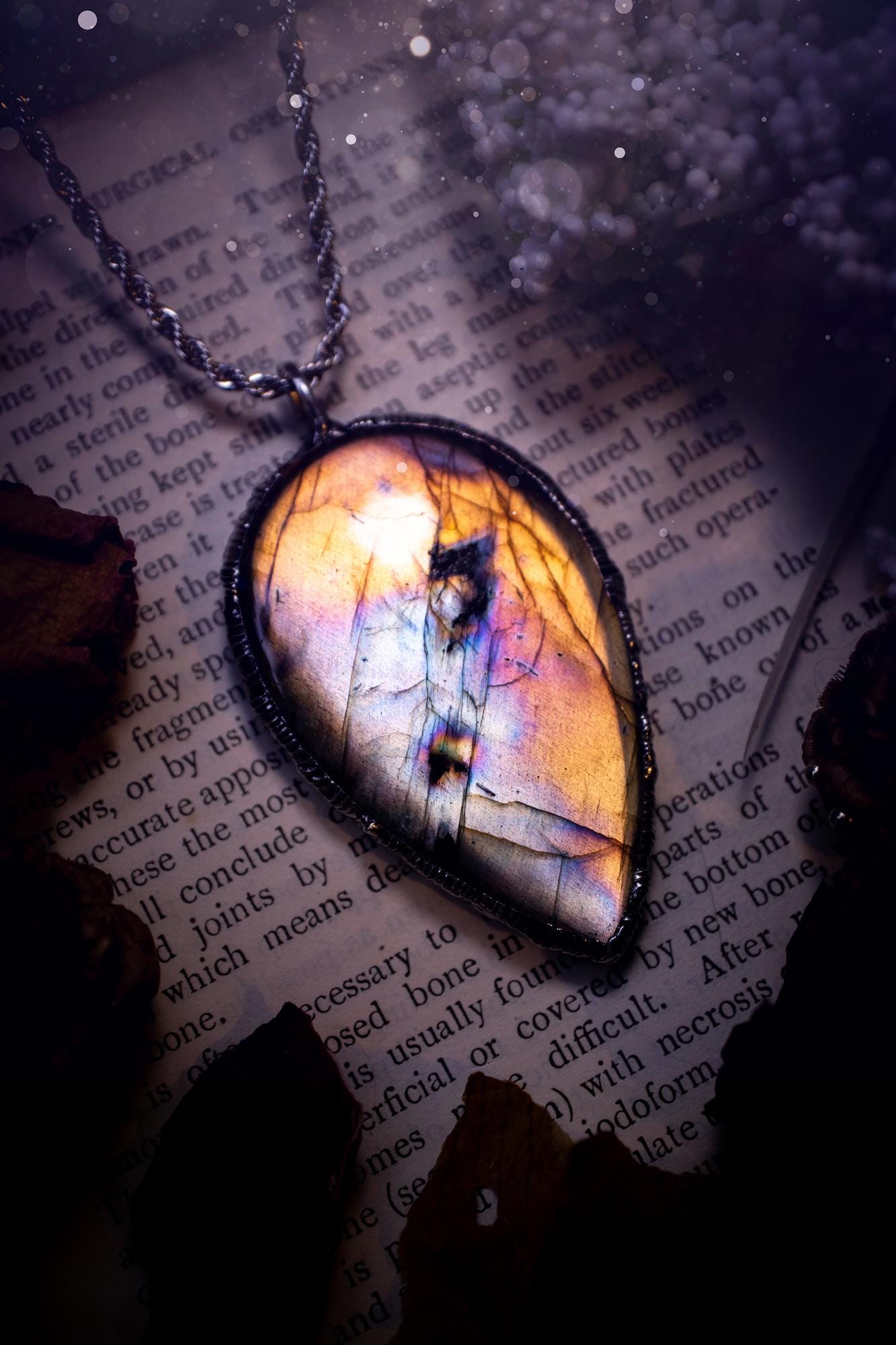 The ultimate labradorite soft soldered pendant necklace. This pendant necklace features the most beautiful, natural and very unique Labradorite spectrolite crystal that has so many hues of silver, purple, pink and orange. Handmade using the tiffany technique, also known as soft soldering. This piece is made from solder which contains silver and is safe to wear. The ideal gift for any jewellery lover and crystal collector! Witchy, gothic and hippy jewellery that has been made for the soul.