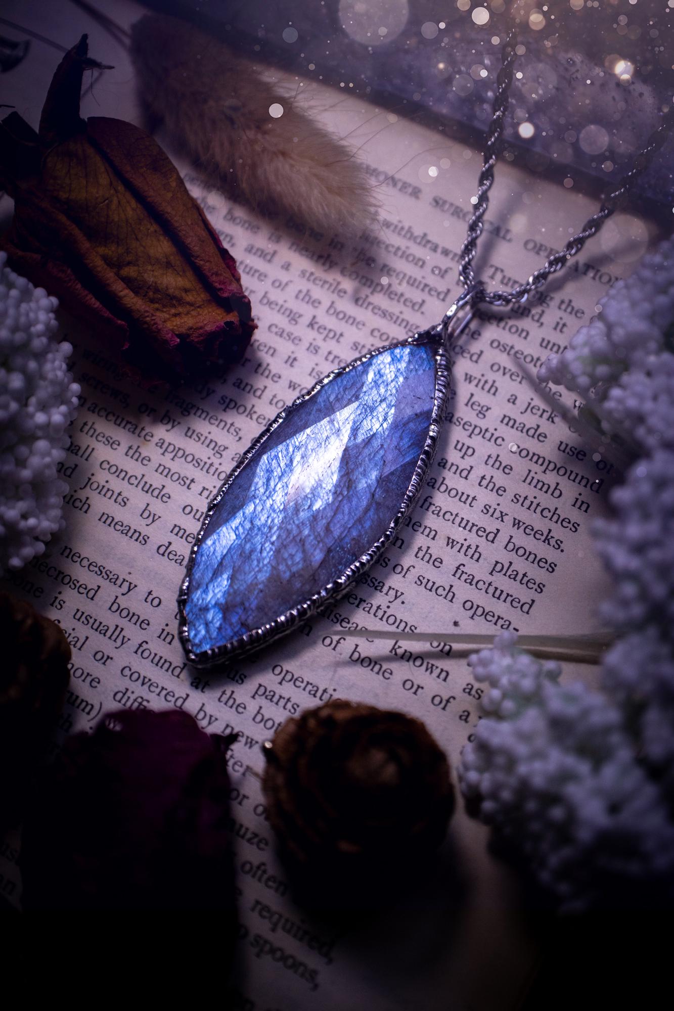 Handmade and beautiful, rose cut, belomorite, soft soldered pendant necklace. This pendant necklace features the most gorgeous and flashy belomorite moonstone crystal, full of glittery shimmer and a deep lovely blue hue. Handcrafted using the soft solder method, also known as the tiffany technique, an ancient technique used to created stained glass windows. The solder used is lead free and totally safe to wear, it contains elements of silver and polishes up to a high lustre. Gothic jewellery