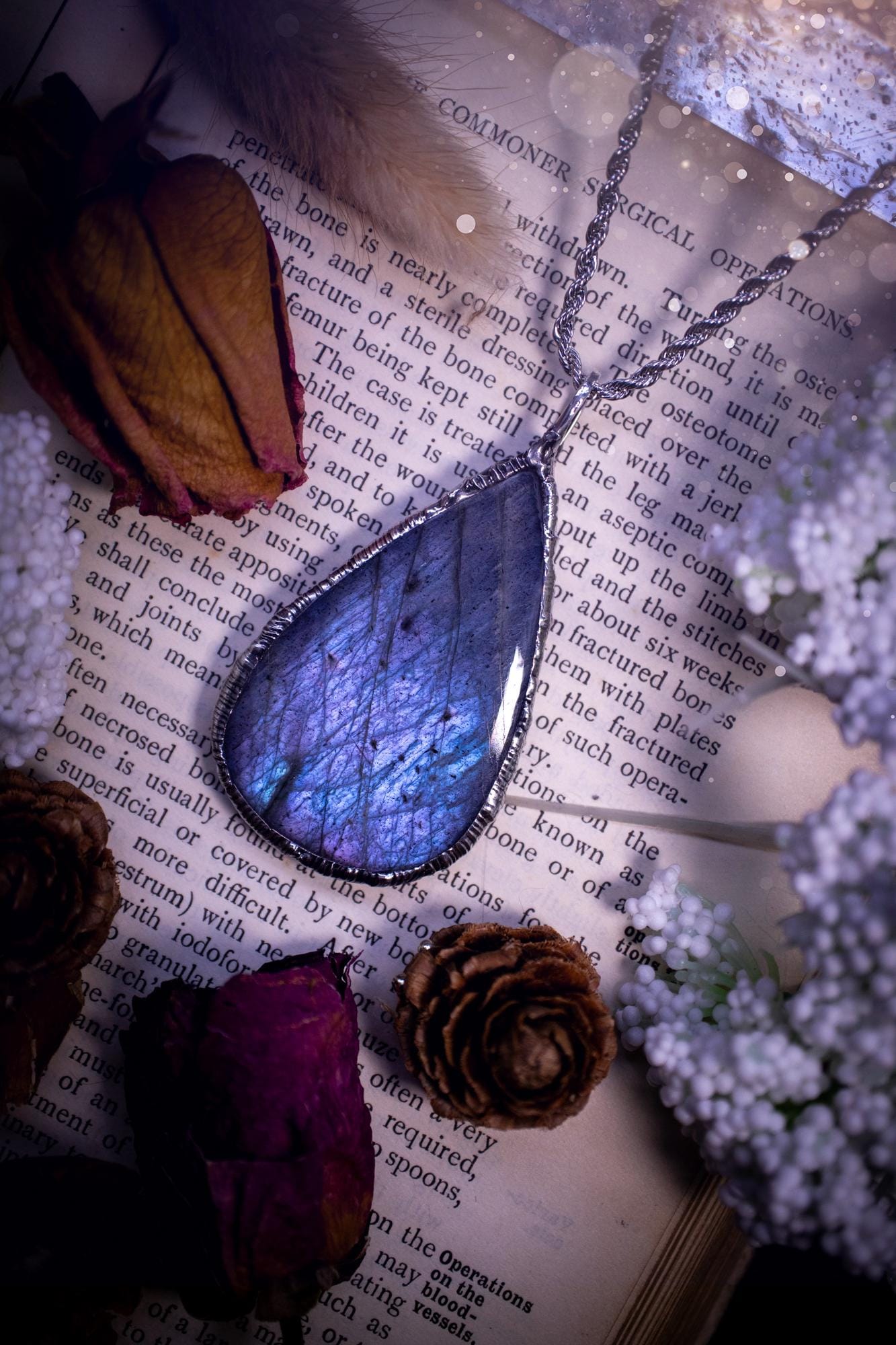 The ultimate labradorite soft soldered pendant necklace. This pendant necklace features the most beautiful and natural Labradorite spectrolite crystal that has so many hues of pastel blue and purples. Handmade using the tiffany technique, also known as soft soldering. This piece is made from solder which contains metals and silver and is safe to wear. The ideal gift for any jewellery lover and crystal collector! Witchy, gothic and hippy jewellery that has been made for the soul.