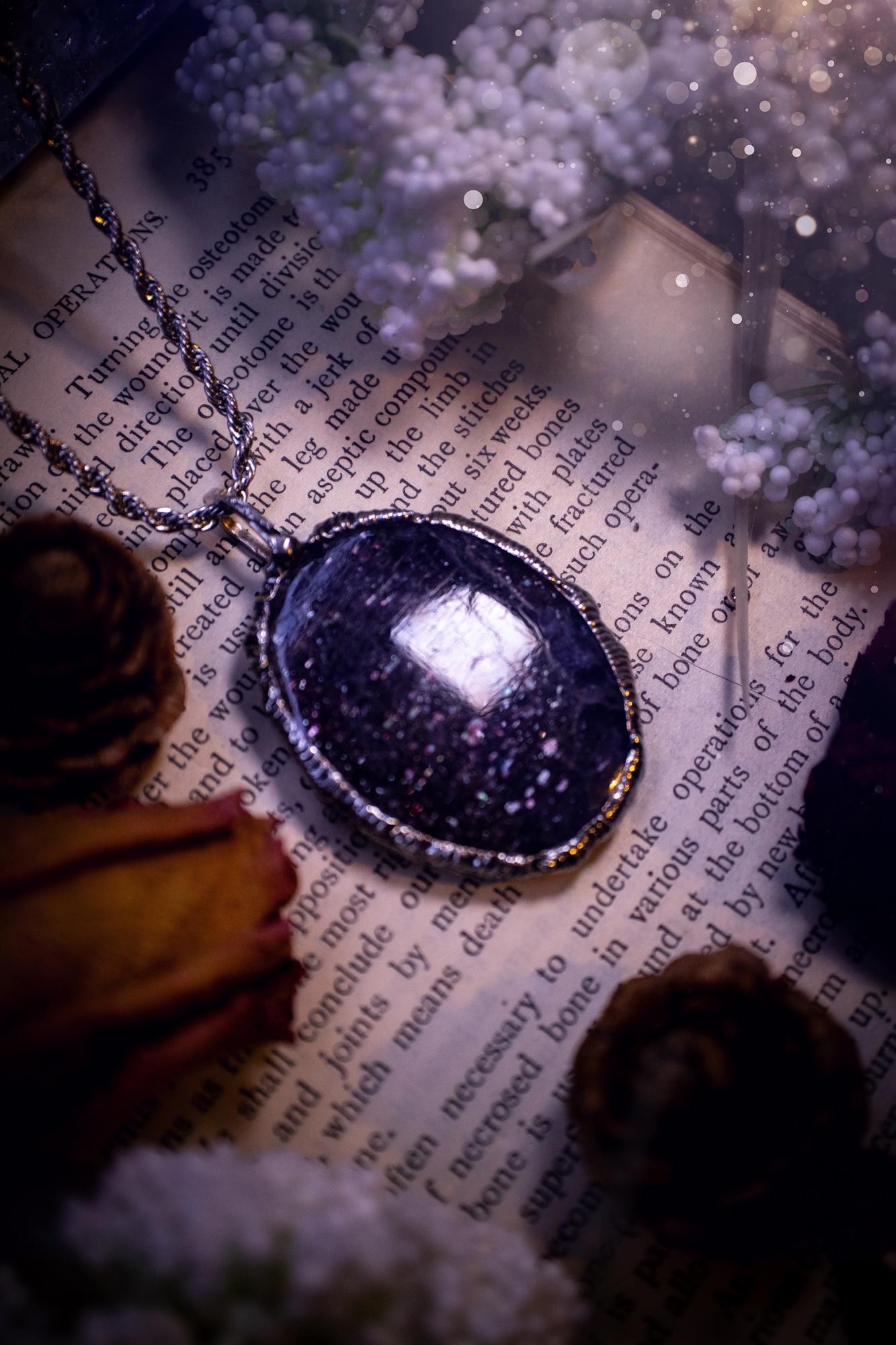 Beautiful and very unique, iolite sunstone crystal, soft soldered pendant necklace. This pendant feature the most sparkly iolite sunstone crystal and is full of purple hues with shimmer! Handmade using the tiffany technique, also known as soft soldering. This piece is made from solder which contains metals and silver and is safe to wear. The ideal gift for any jewellery lover and crystal collector! Witchy, gothic and hippy jewellery that has been made for the soul.