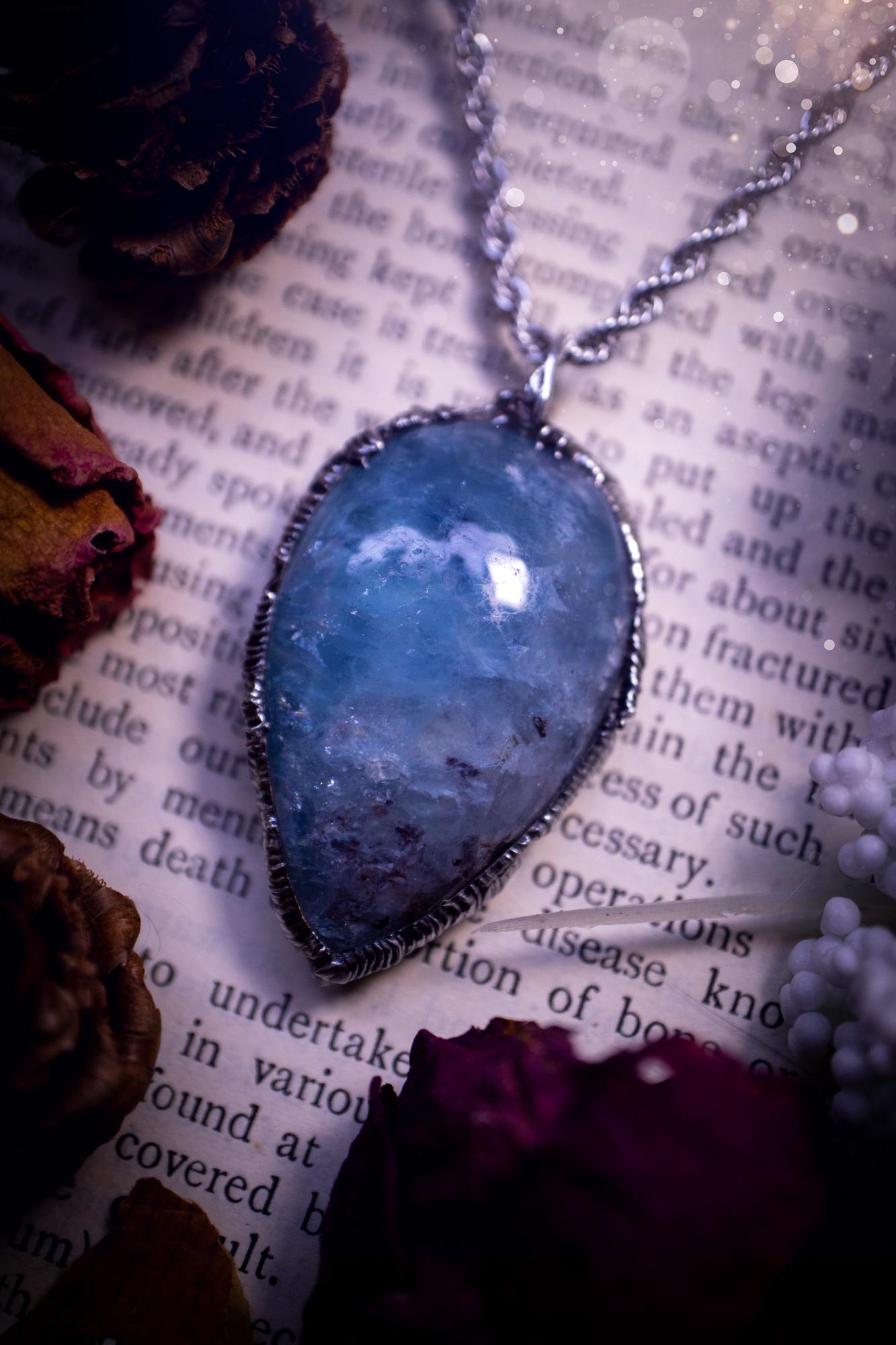 Beautiful and gemmy, large aquamarine soft soldered pendant necklace. This pendant feature the most gemmy, deep blue aquamarine crystal and is full of flash with shimmer! Handmade using the tiffany technique, also known as soft soldering. This piece is made from solder which contains metals and silver and is safe to wear. The ideal gift for any jewellery lover and crystal collector! Witchy, gothic and hippy jewellery that has been made for the soul.