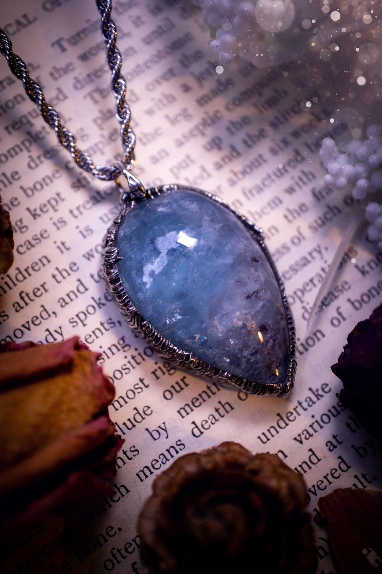 Beautiful and gemmy, large aquamarine soft soldered pendant necklace. This pendant feature the most gemmy, deep blue aquamarine crystal and is full of flash with shimmer! Handmade using the tiffany technique, also known as soft soldering. This piece is made from solder which contains metals and silver and is safe to wear. The ideal gift for any jewellery lover and crystal collector! Witchy, gothic and hippy jewellery that has been made for the soul.