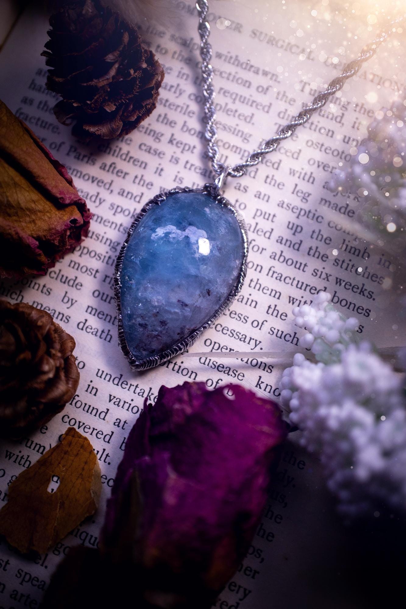 Beautiful and gemmy, large aquamarine soft soldered pendant necklace. This pendant feature the most gemmy, deep blue aquamarine crystal and is full of flash with shimmer! Handmade using the tiffany technique, also known as soft soldering. This piece is made from solder which contains metals and silver and is safe to wear. The ideal gift for any jewellery lover and crystal collector! Witchy, gothic and hippy jewellery that has been made for the soul.