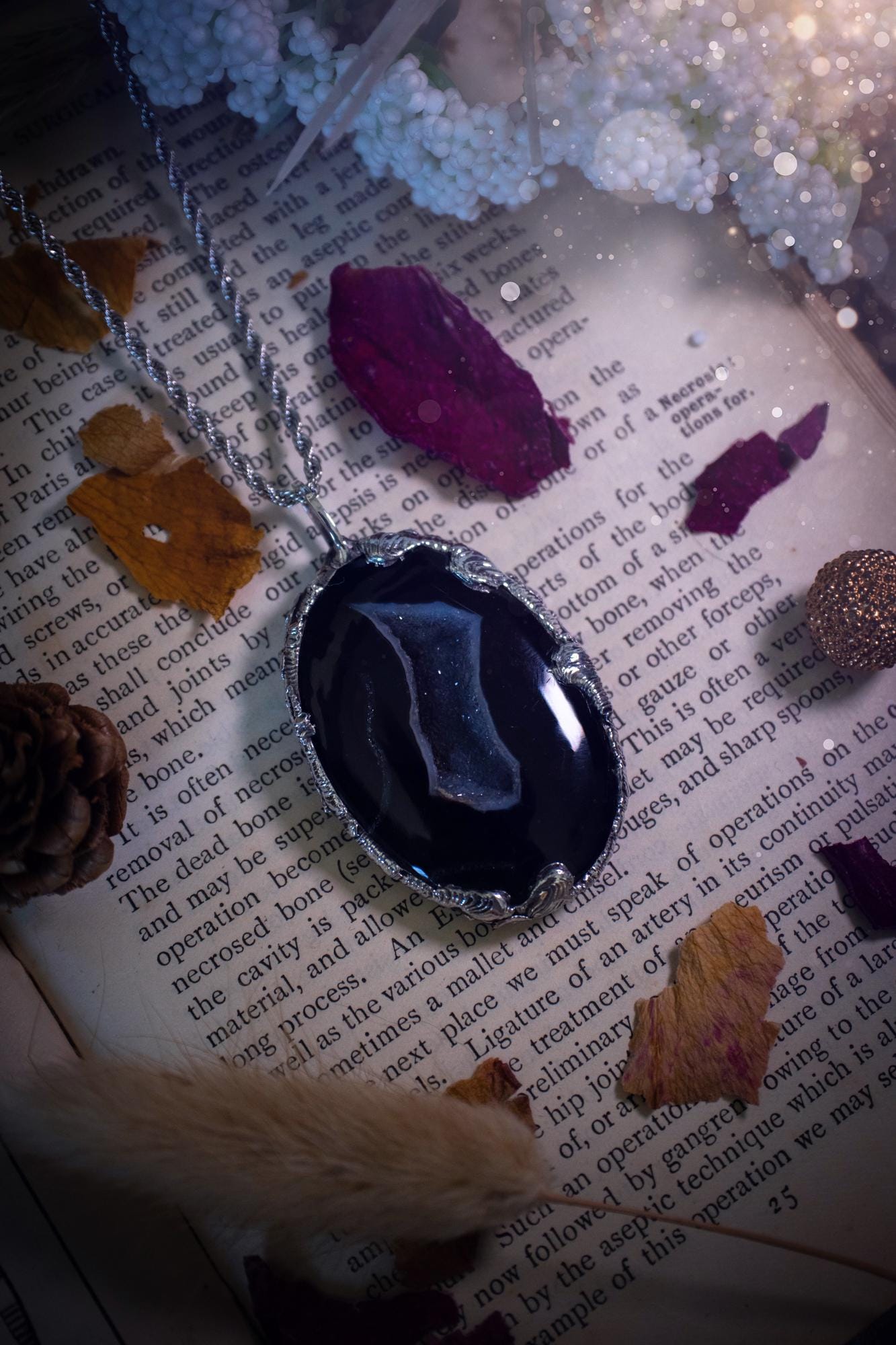 Beautiful and handcrafted, black druzy agate, crystal pendant necklace. This one of a kind piece of jewellery has been hand made using the tiffany technique, also known as soft soldering. The bezel is made with a solder that is lead free and contains elements of silver so when polished a high lustre is achieved. Featuring a large druzy agate with beautiful sparkle and banding. This is the ideal gift for any crystal or jewellery lover that likes a gothic and witchy vibe and aesthetic.