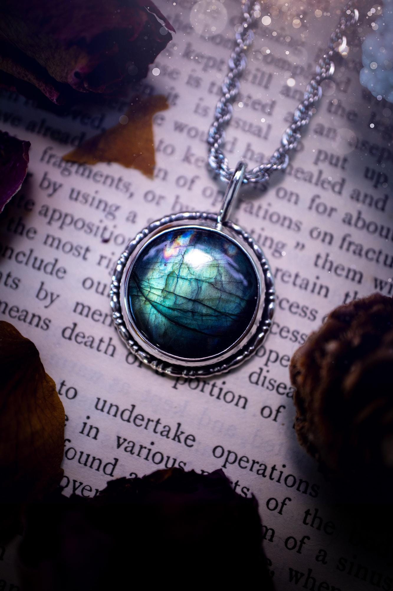Beautiful and handmade, teal green with a little rainbow, sterling silver pendant necklace. This necklace features a beautiful, forest teal green Labradorite crystal that is completely natural. The pendant itself has been handcrafted using a mix of 999 fine and sterling silver with gallery wire around the bezel to give it a unique feel. A one of a kind piece of jewellery that would complete any crystal or jewellery lovers collection. Witchy and gothic vibes, jewellery gifts for her.
