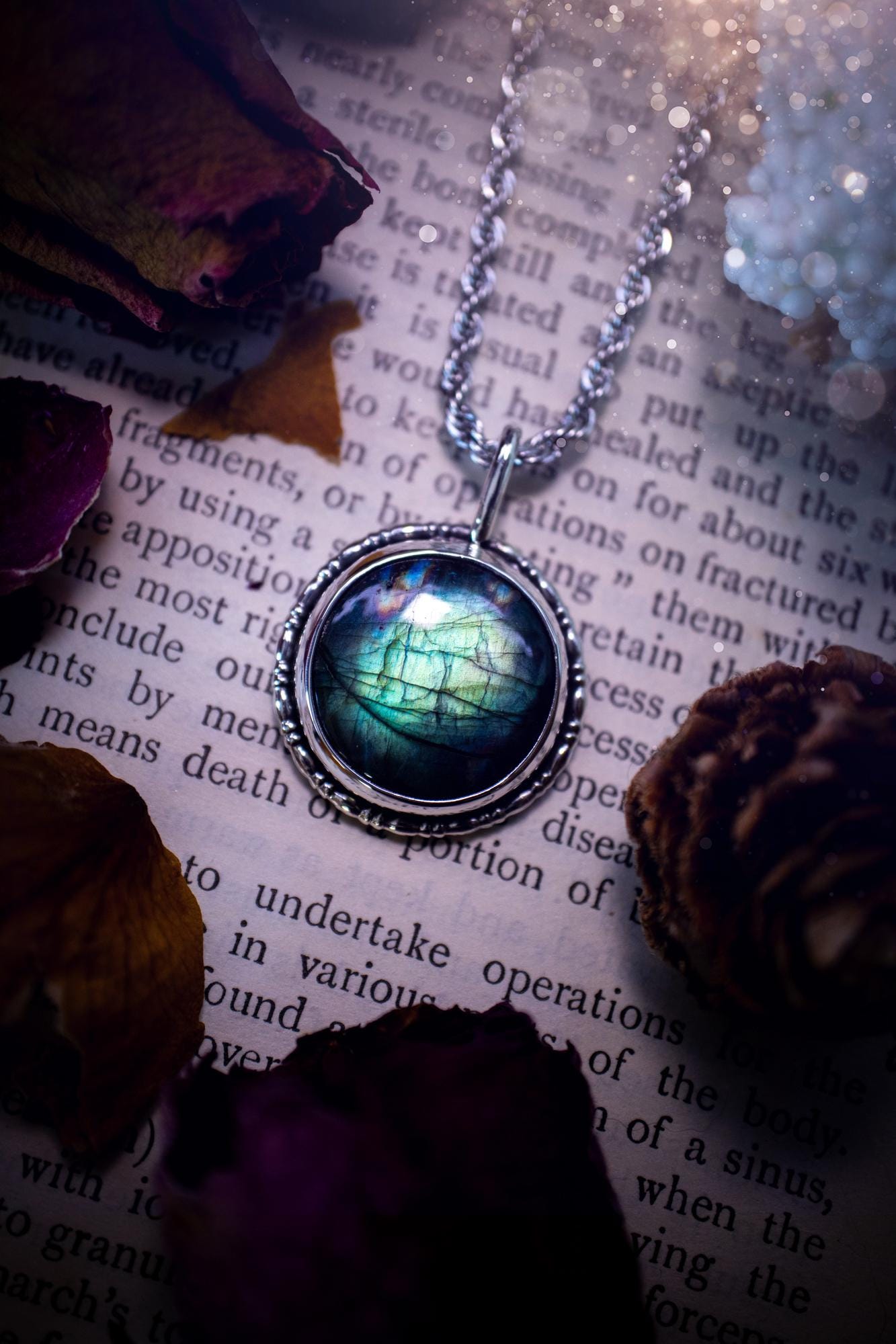 Beautiful and handmade, teal green with a little rainbow, sterling silver pendant necklace. This necklace features a beautiful, forest teal green Labradorite crystal that is completely natural. The pendant itself has been handcrafted using a mix of 999 fine and sterling silver with gallery wire around the bezel to give it a unique feel. A one of a kind piece of jewellery that would complete any crystal or jewellery lovers collection. Witchy and gothic vibes, jewellery gifts for her.