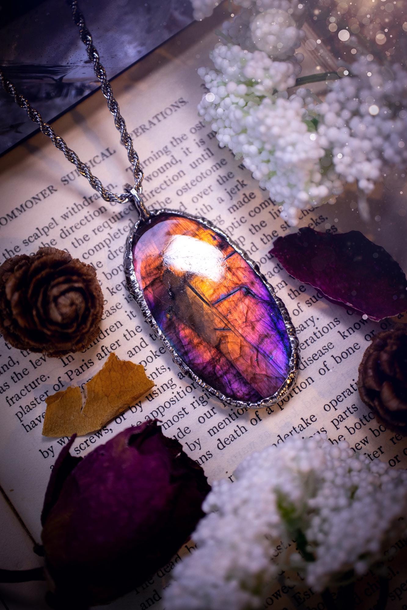 The ultimate labradorite soft soldered pendant necklace. This pendant necklace features the most beautiful and natural Labradorite spectrolite crystal that has so many hues of purple, pink and orange. Handmade using the tiffany technique, also known as soft soldering. This piece is made from solder which contains metals and silver and is safe to wear. The ideal gift for any jewellery lover and crystal collector! Witchy, gothic and hippy jewellery that has been made for the soul.