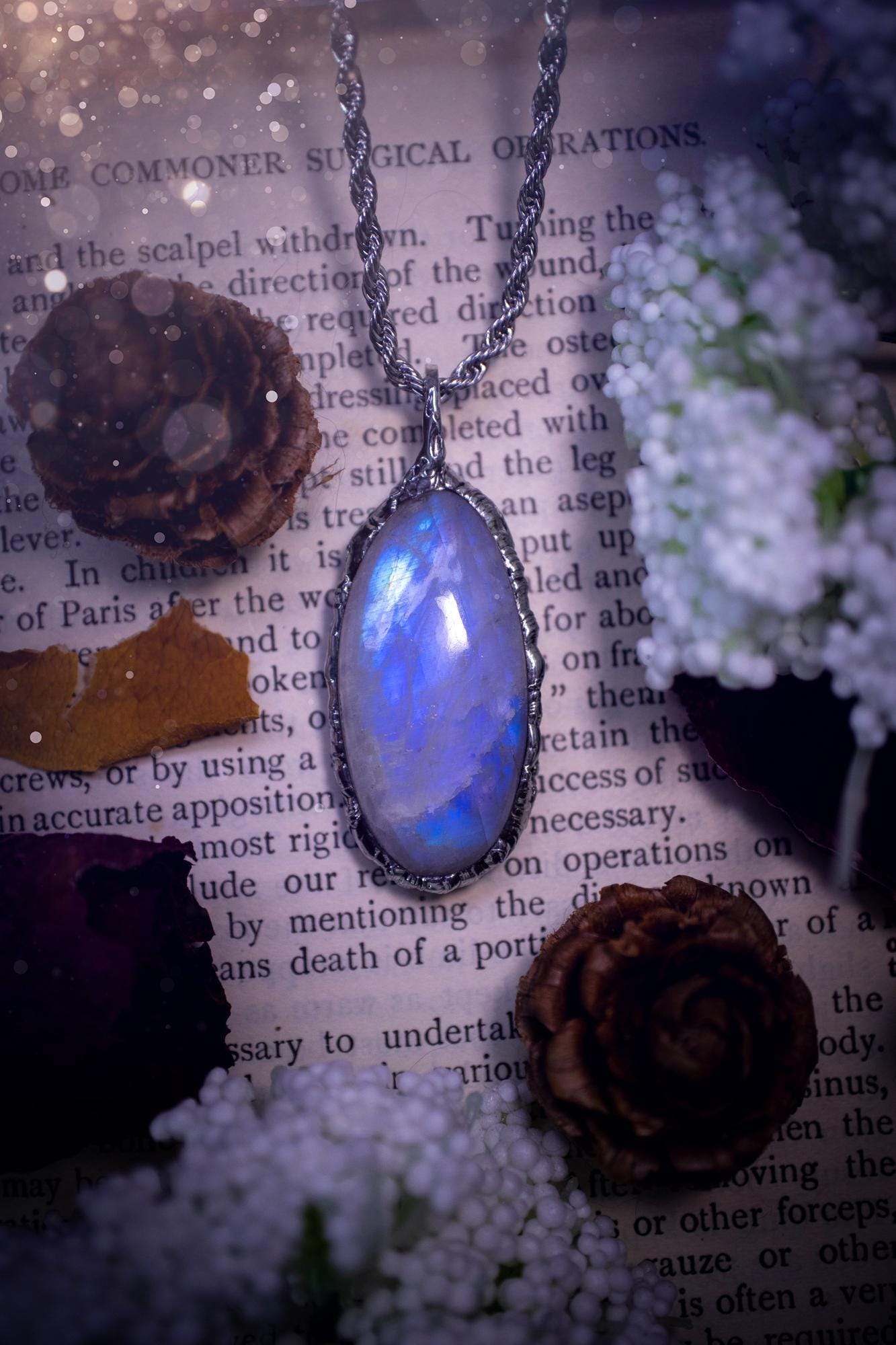 Handmade and beautiful, flashy rainbow moonstone, soft soldered pendant necklace. This pendant necklace features the most gorgeous and flashy rainbow moonstone crystal, full of glittery shimmer and a deep lovely blue hue. Handcrafted using the soft solder method, also known as the tiffany technique, an ancient technique used to created stained glass windows. The solder used is lead free and totally safe to wear, it contains elements of silver and polishes up to a high lustre. Gothic jewellery