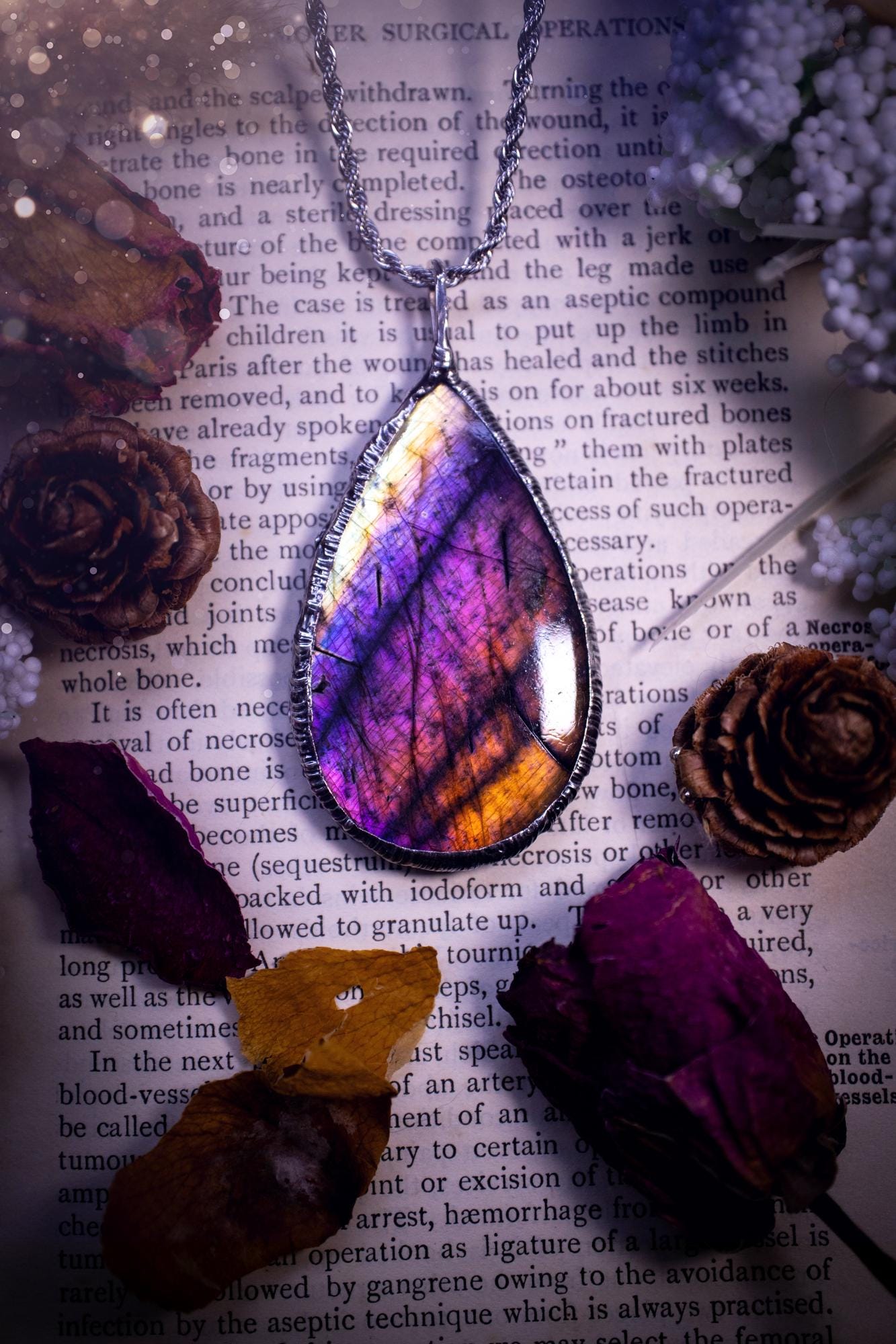 The ultimate labradorite soft soldered pendant necklace. This pendant necklace features the most beautiful and natural Labradorite spectrolite crystal that has so many hues of silver, purple, pink and orange. Handmade using the tiffany technique, also known as soft soldering. This piece is made from solder which contains metals and silver and is safe to wear. The ideal gift for any jewellery lover and crystal collector! Witchy, gothic and hippy jewellery that has been made for the soul.