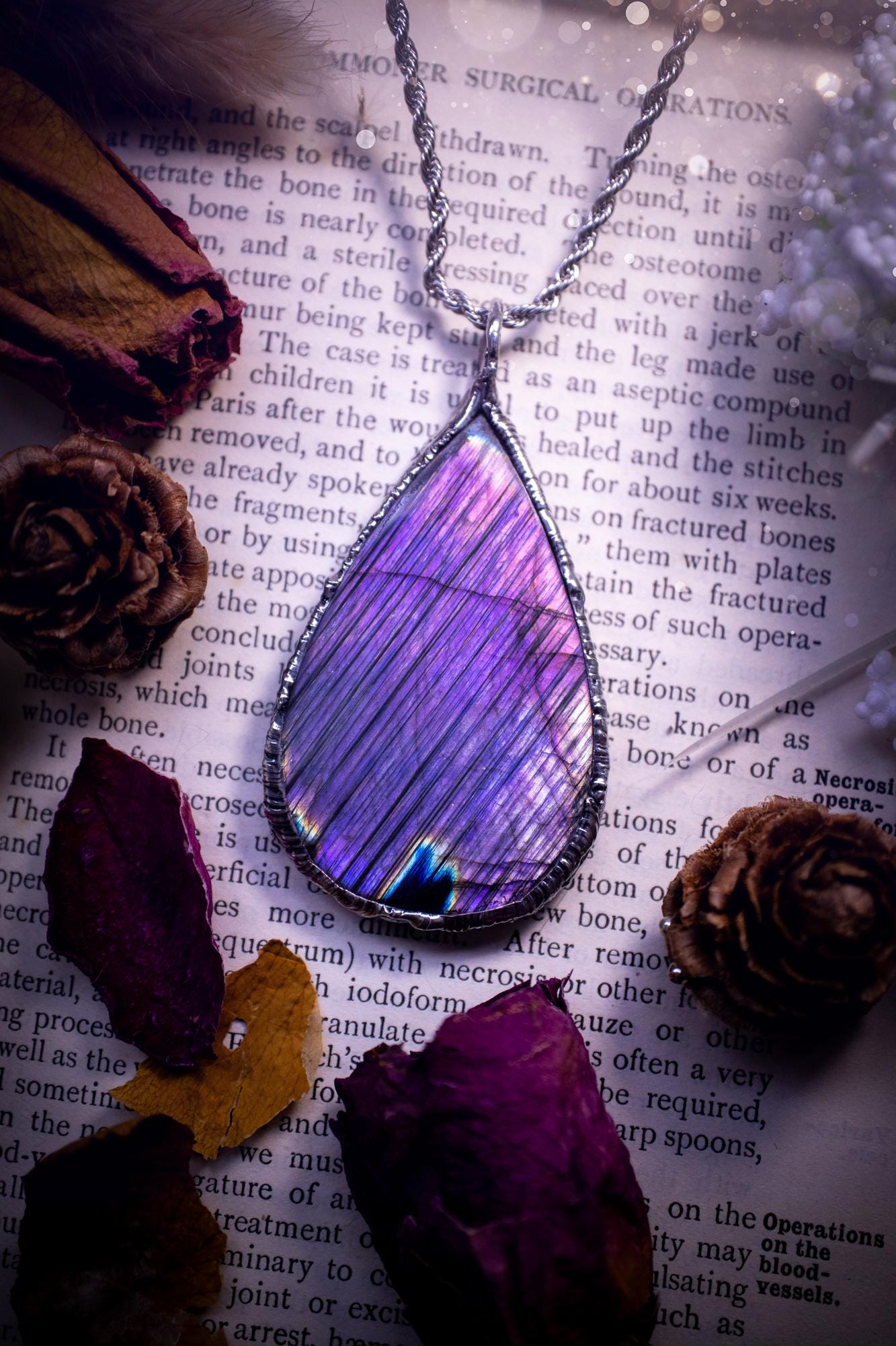 The ultimate labradorite soft soldered pendant necklace. This pendant necklace features the most beautiful and natural Labradorite spectrolite crystal that has so many hues of blue and purple, with stripes. Handmade using the tiffany technique, also known as soft soldering. This piece is made from solder which contains metals and silver and is safe to wear. The ideal gift for any jewellery lover and crystal collector! Witchy, gothic and hippy jewellery that has been made for the soul.