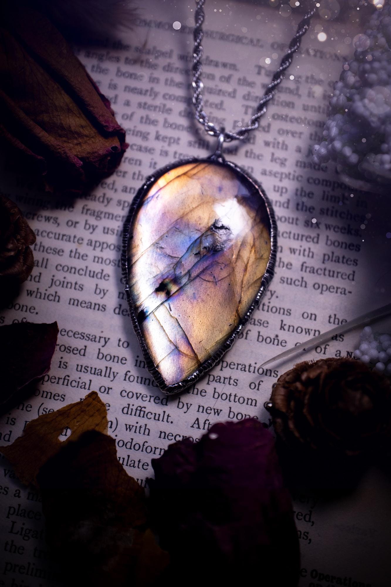 The ultimate labradorite soft soldered pendant necklace. This pendant necklace features the most beautiful, natural and very unique Labradorite spectrolite crystal that has so many hues of silver, purple, pink and orange. Handmade using the tiffany technique, also known as soft soldering. This piece is made from solder which contains silver and is safe to wear. The ideal gift for any jewellery lover and crystal collector! Witchy, gothic and hippy jewellery that has been made for the soul.