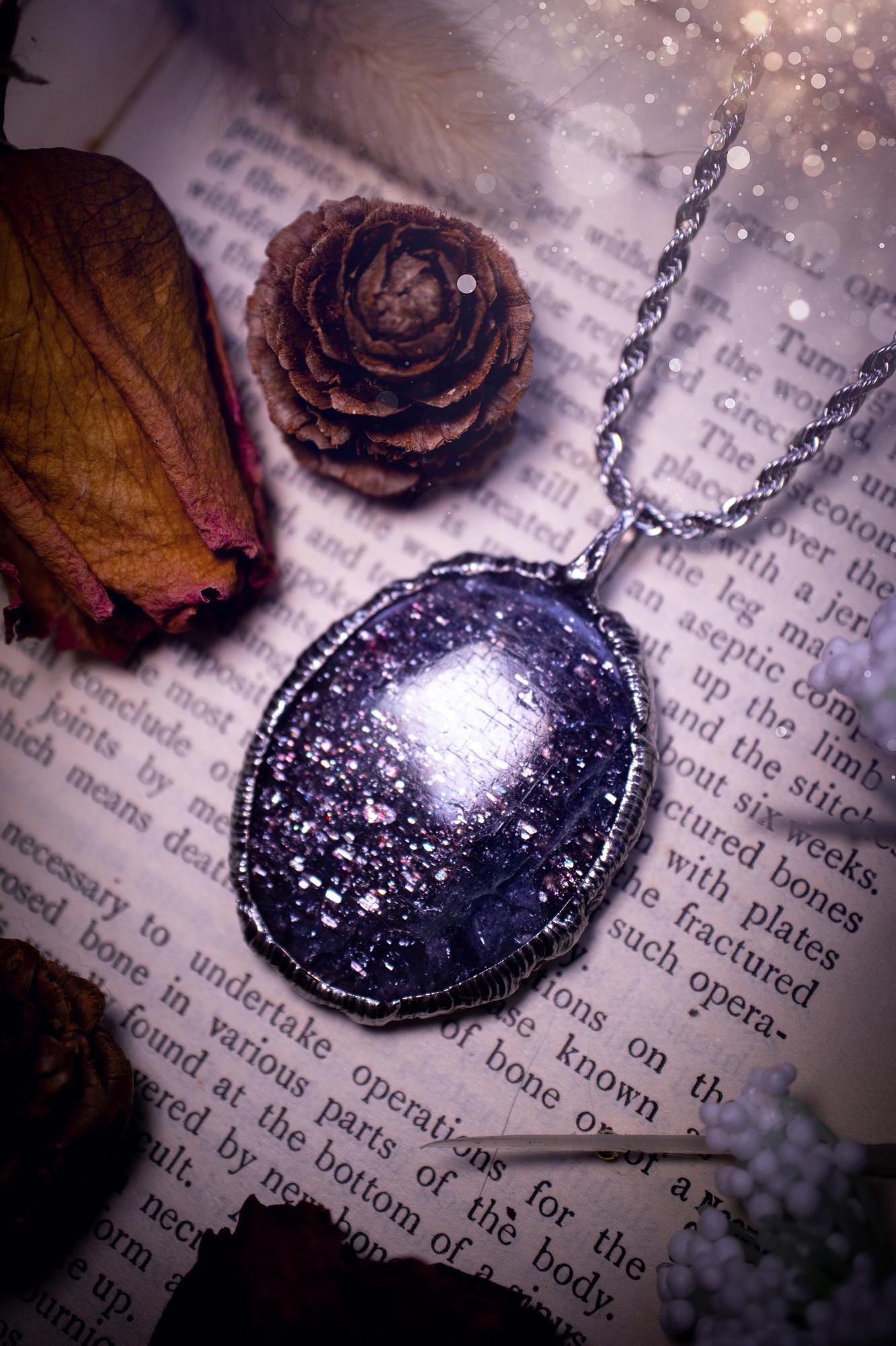 Beautiful and very unique, iolite sunstone crystal, soft soldered pendant necklace. This pendant feature the most sparkly iolite sunstone crystal and is full of purple hues with shimmer! Handmade using the tiffany technique, also known as soft soldering. This piece is made from solder which contains metals and silver and is safe to wear. The ideal gift for any jewellery lover and crystal collector! Witchy, gothic and hippy jewellery that has been made for the soul.