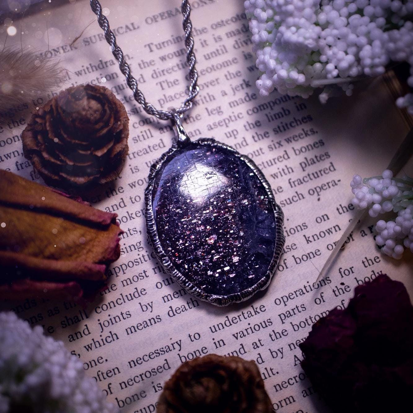 Beautiful and very unique, iolite sunstone crystal, soft soldered pendant necklace. This pendant feature the most sparkly iolite sunstone crystal and is full of purple hues with shimmer! Handmade using the tiffany technique, also known as soft soldering. This piece is made from solder which contains metals and silver and is safe to wear. The ideal gift for any jewellery lover and crystal collector! Witchy, gothic and hippy jewellery that has been made for the soul.