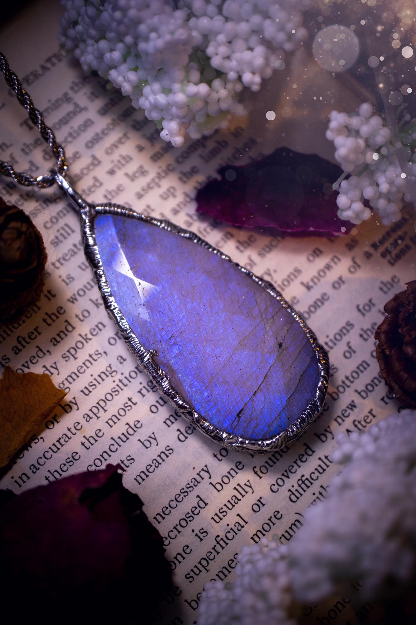 Handmade and beautiful, rose cut, belomorite, soft soldered pendant necklace. This pendant necklace features the most gorgeous and flashy belomorite moonstone crystal, full of glittery shimmer and a deep lovely blue hue. Handcrafted using the soft solder method, also known as the tiffany technique, an ancient technique used to created stained glass windows. The solder used is lead free and totally safe to wear, it contains elements of silver and polishes up to a high lustre. Gothic jewellery